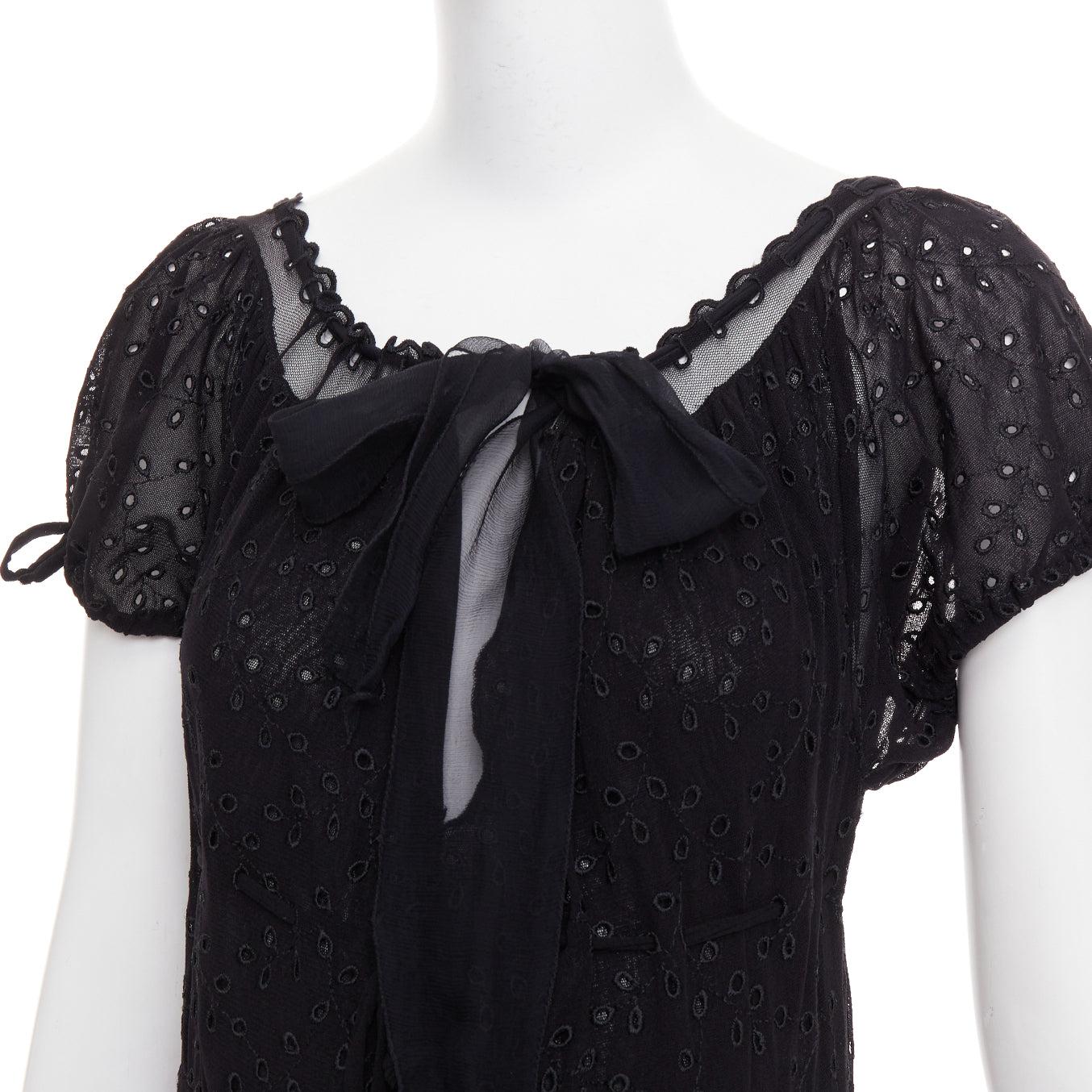 JEAN PAUL GAULTIER MAILLE FEMME Vintage black eyelet ruffle self tie dress M
Reference: CC/A00472
Brand: Jean Paul Gaultier
Designer: Jean Paul Gaultier
Collection: MAILLE FEMME
Material: Polyamide
Color: Black
Pattern: Solid
Closure: Self