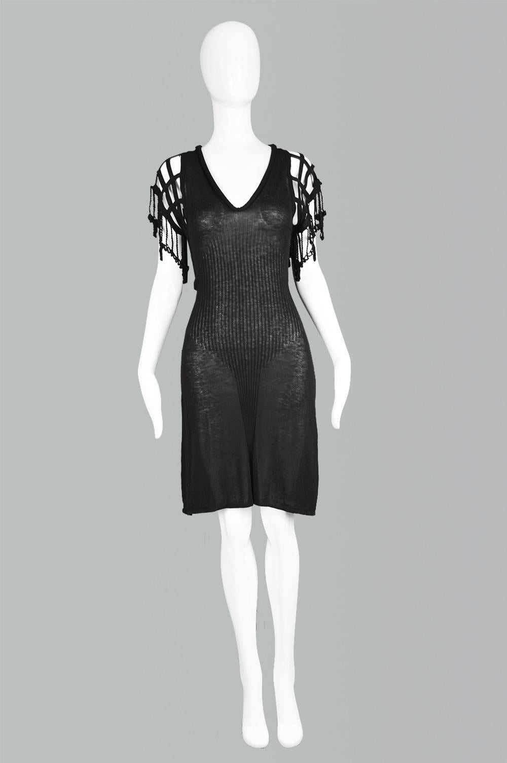 Jean Paul Gaultier Maille Femme Vintage Fine Knit Crochet Sleeve Dress

Click 'Continue Reading' for size and description.

Size: Marked XS but best fits a UK 6-8/ US 2-4/ EU 34-36 due to stretch. 
Bust - Stretches up to 34” / 86cm
Waist - Stretches