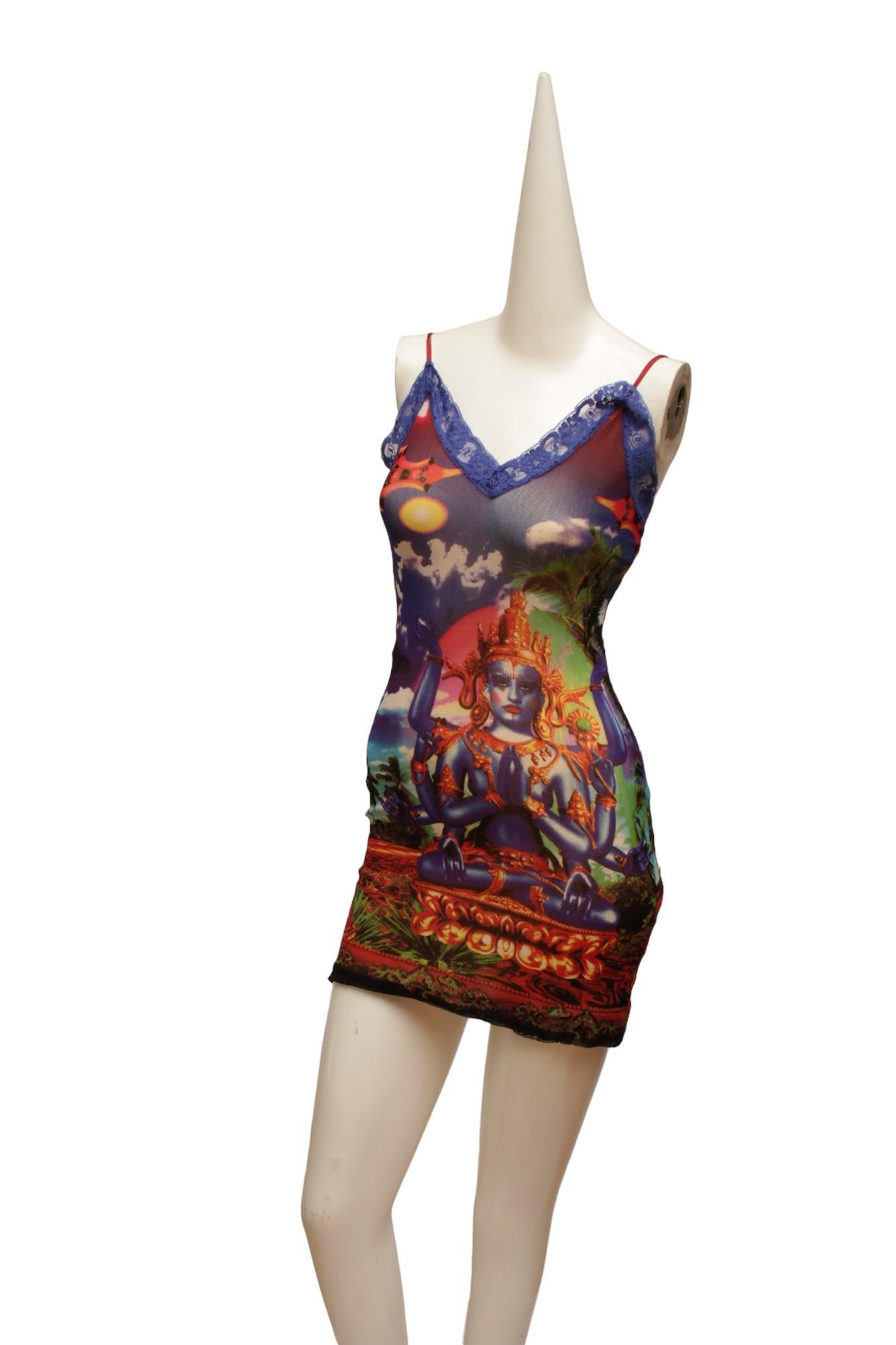 JEAN PAUL GAULTIER, Maille, MESH, Hindu G-d Shiva Butterfly Tattoo midi dress, marked Size Small

Strappy dress has a nude lining with a black lace hem and purple lace edges on top. Deep and vibrant cyan and magenta hues. 

Back length: 24