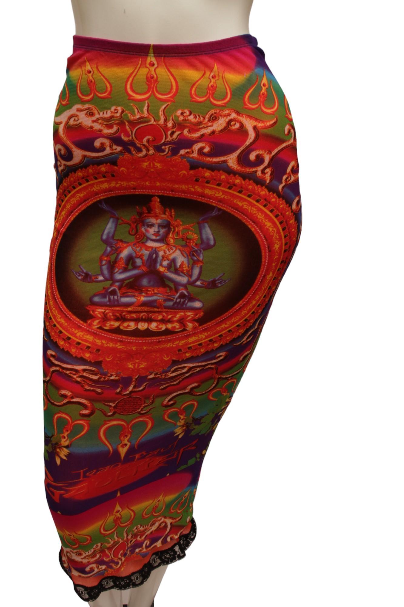 JEAN PAUL GAULTIER, Maille, MESH, Hindu G-d Shiva Butterfly Tattoo Convertible Long Skirt or Tube Dress marked size Small. Stretches and may go to Medium. As pictured with matching long sleeve skirt, not included.

Skirt has a orange lining with a