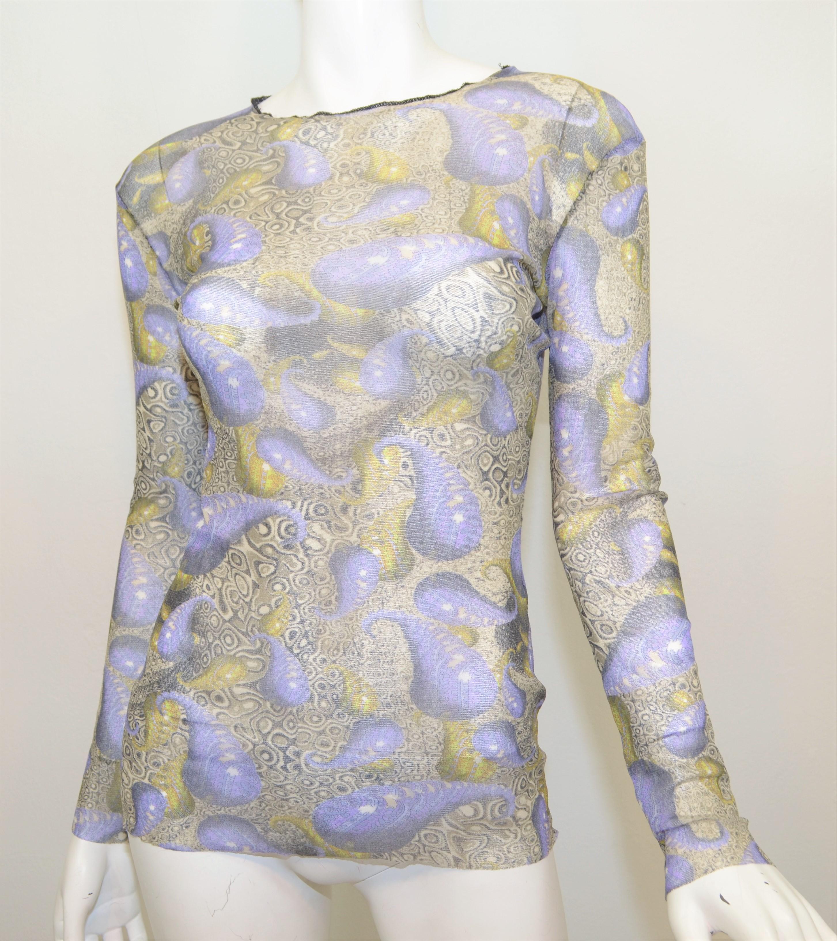 Jean Paul Gaultier top is featured in a variation of grey, purple, and green colors throughout with a paisley print throughout the mesh knit fabric. Top is a size Small, made in Italy. Top is in excellent condition with no major flaws to
