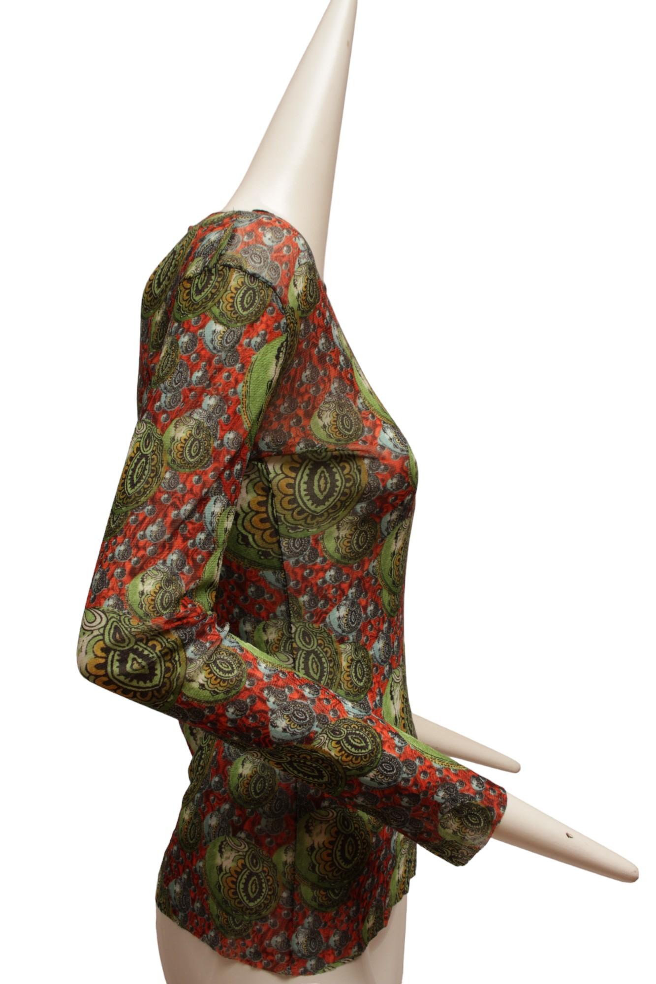 JEAN PAUL GAULTIER, Maille, Mesh 1990s, Psychedelic multiplying planetary long sleeve top with Indian pattern

Shoulder-to-shoulder: 14