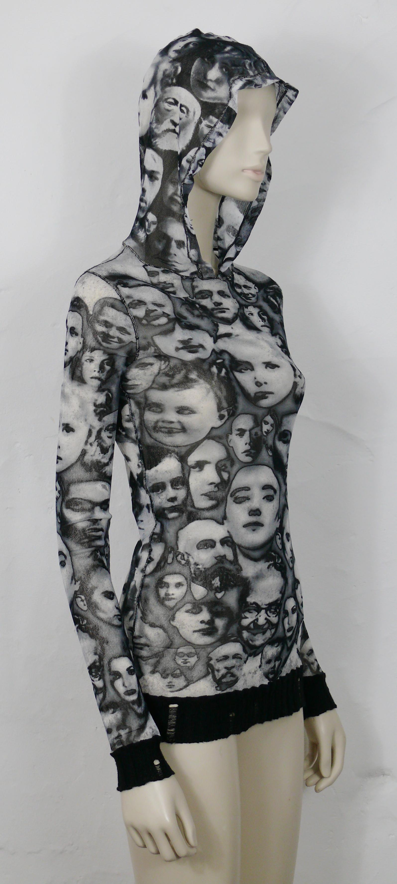 JEAN PAUL GAULTIER Maille Femme vintage iconic sheer mesh hooded top featuring a black and white faces print.

This top features :
- FUZZI sheer mesh in black and white featuring an iconic faces print all-over.
- Long sleeves.
- Hood.
- Exposed