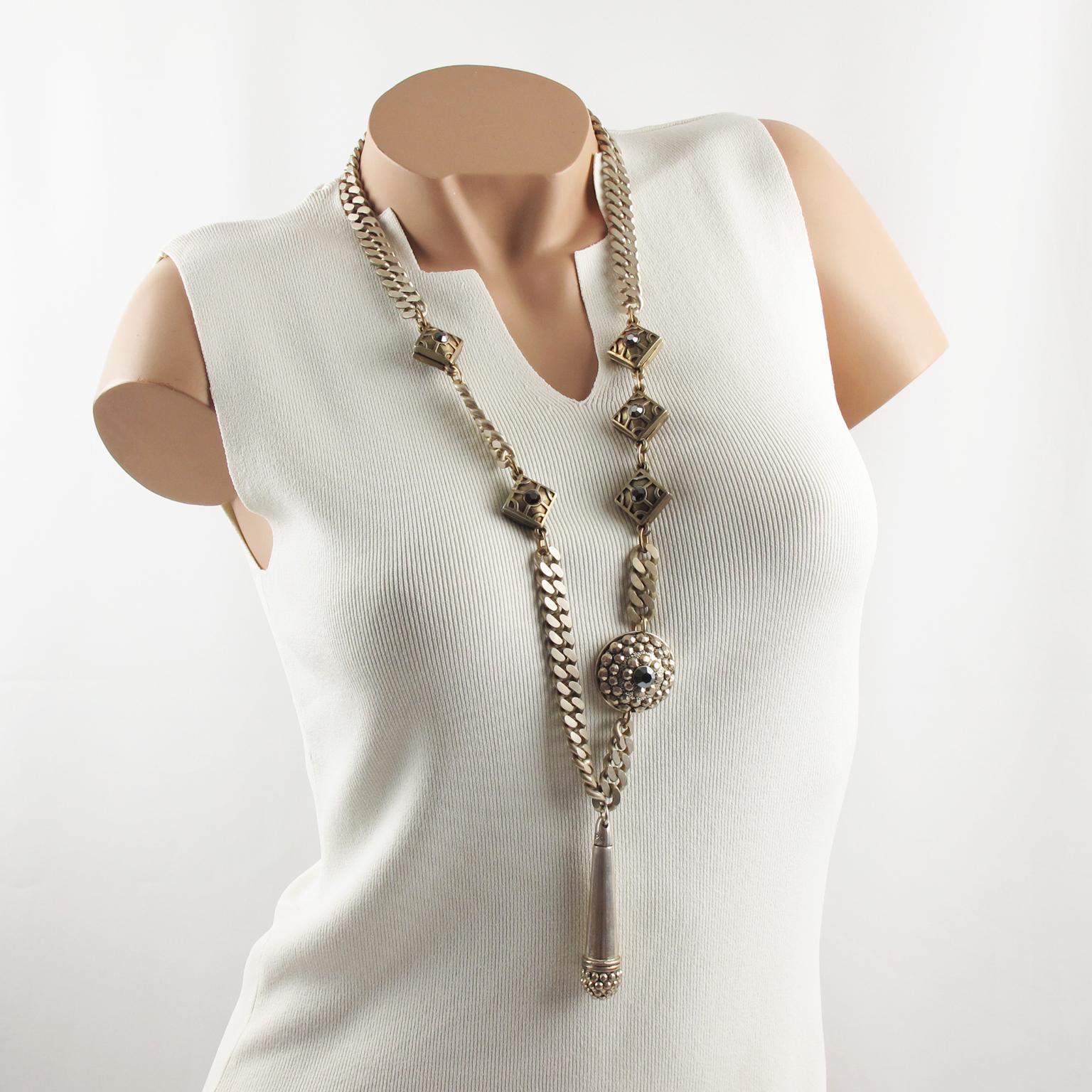 Handsome Jean Paul Gaultier Paris extra-long necklace. Silvered metal necklace with a naturally aged patina, featuring modernist heavy and thick chain with jeweled medallions. Each medallion is topped with black metallic rhinestones. The necklace is