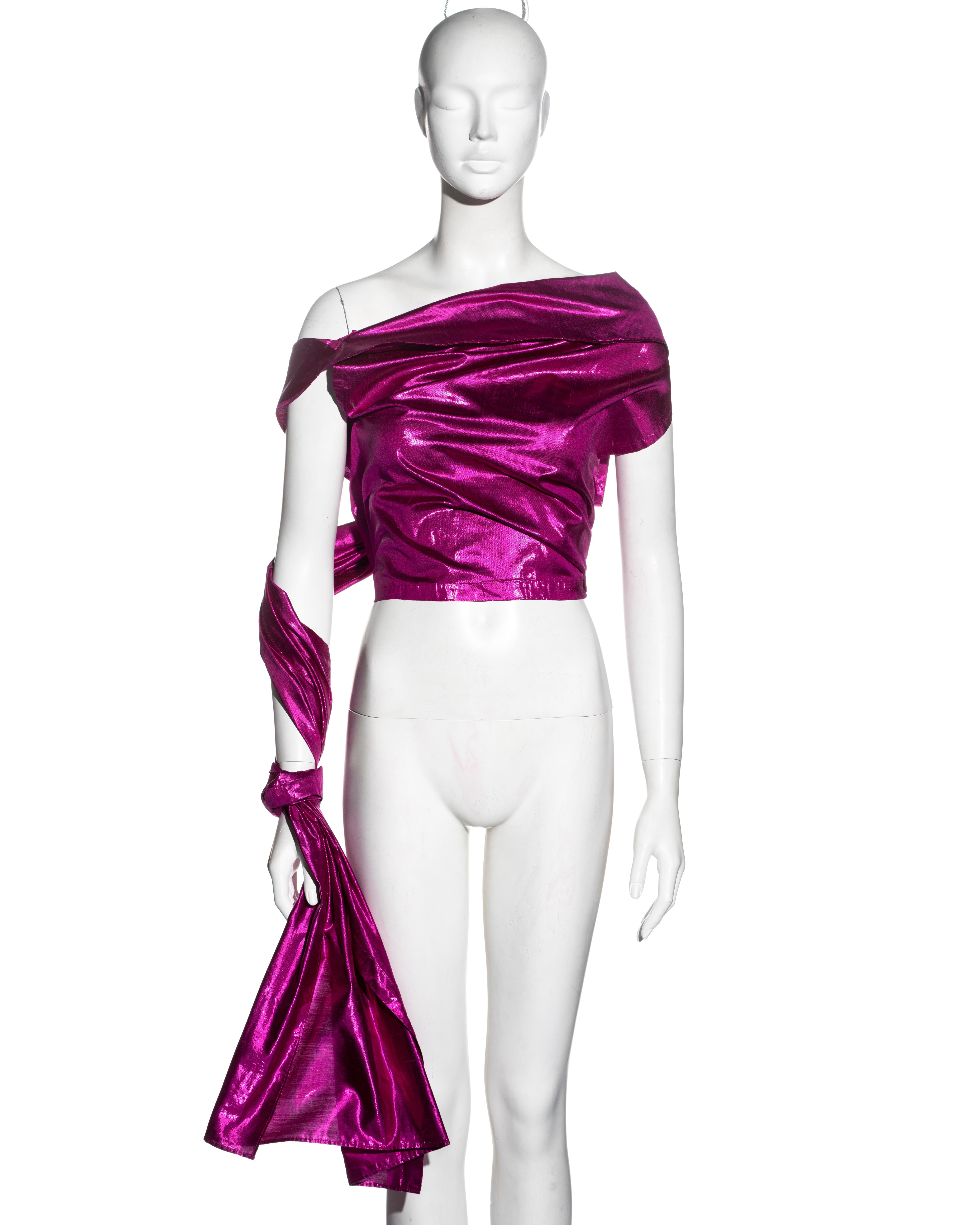 ▪ Jean Paul Gaultier wrap top
▪ Metallic fuchsia pink silk taffeta 
▪ Extra long panel allowing the garment to be styled in multiple ways
▪ IT 46 - FR 42 - UK 14 
▪ Spring-Summer 2000
▪ 61% Polyester, 39% Silk
▪ Made in Italy