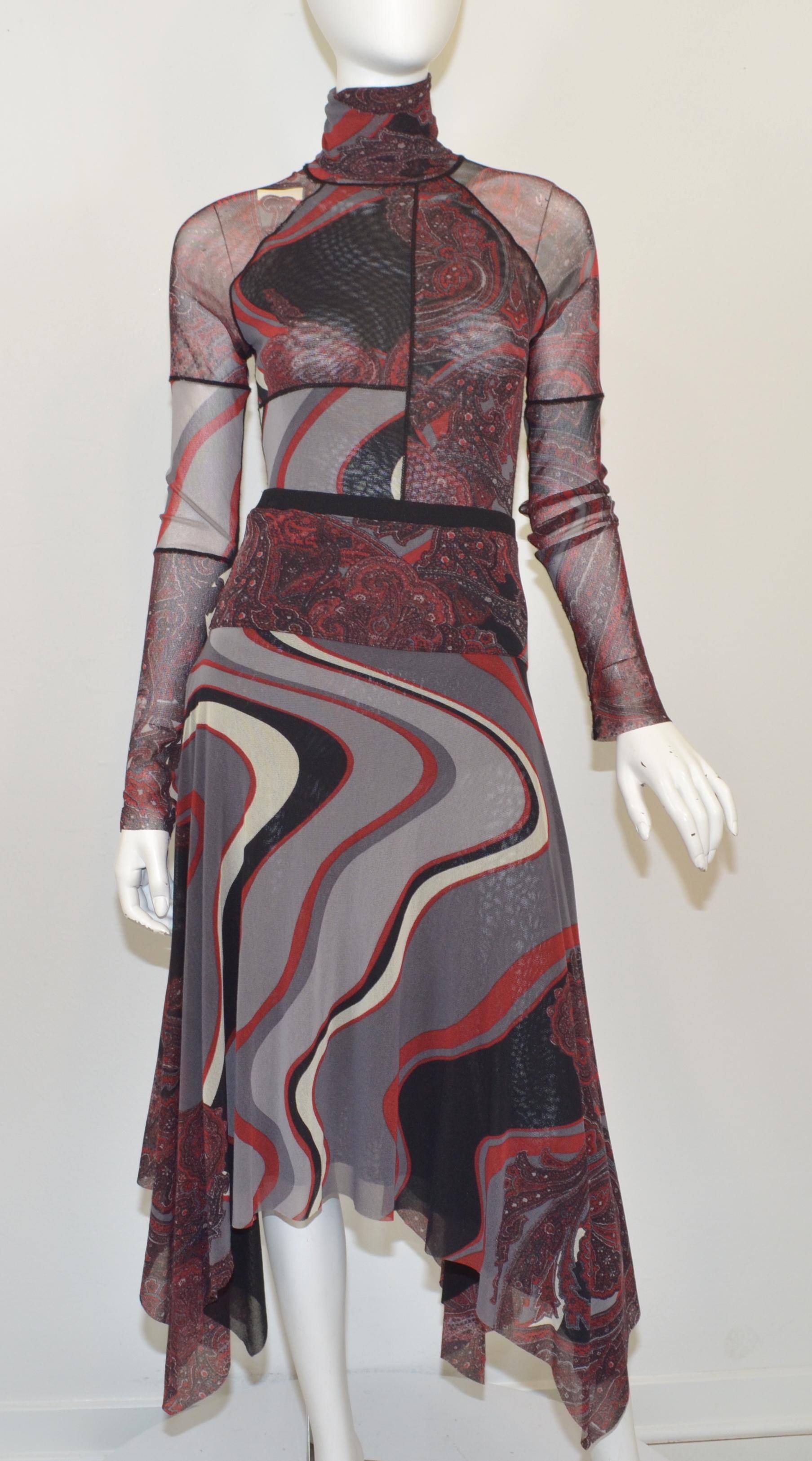 Jean Paul Gaultier set features a maroon, black and grey mixed print thourhgout a nylon mesh knit fabric. Skirt has an elasticized waist band and a handkerchief cut hem. Top is a size M and skirt is a size S, composed with 100% nylon, made in