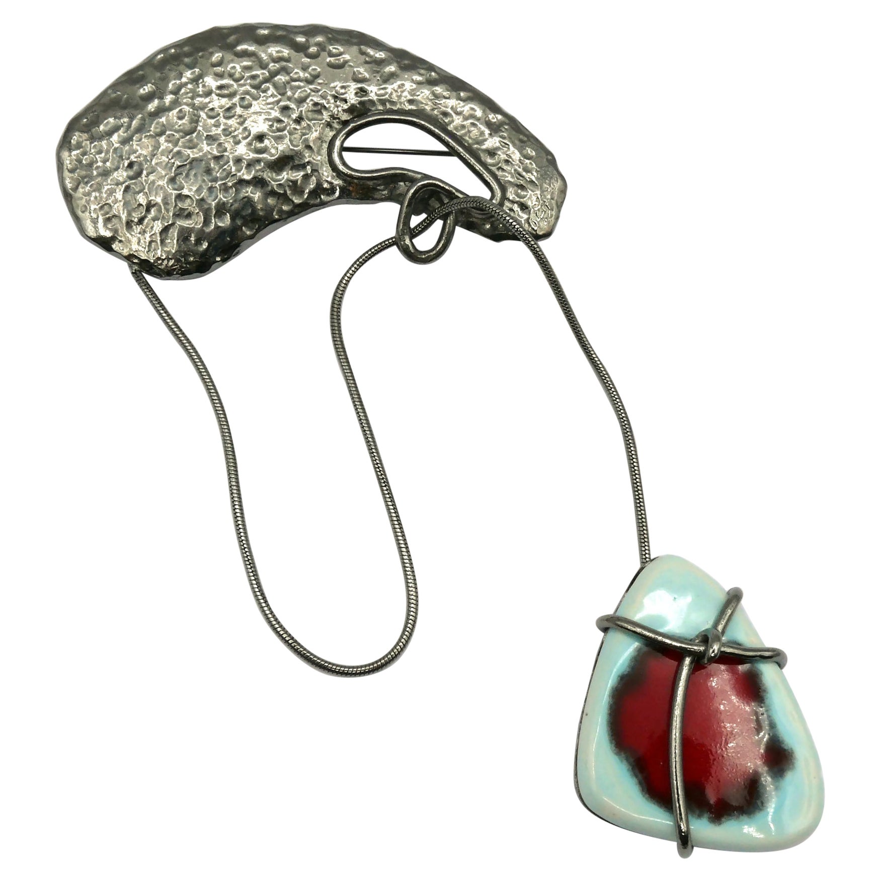 JEAN PAUL GAULTIER Broche colgante móvil modernista