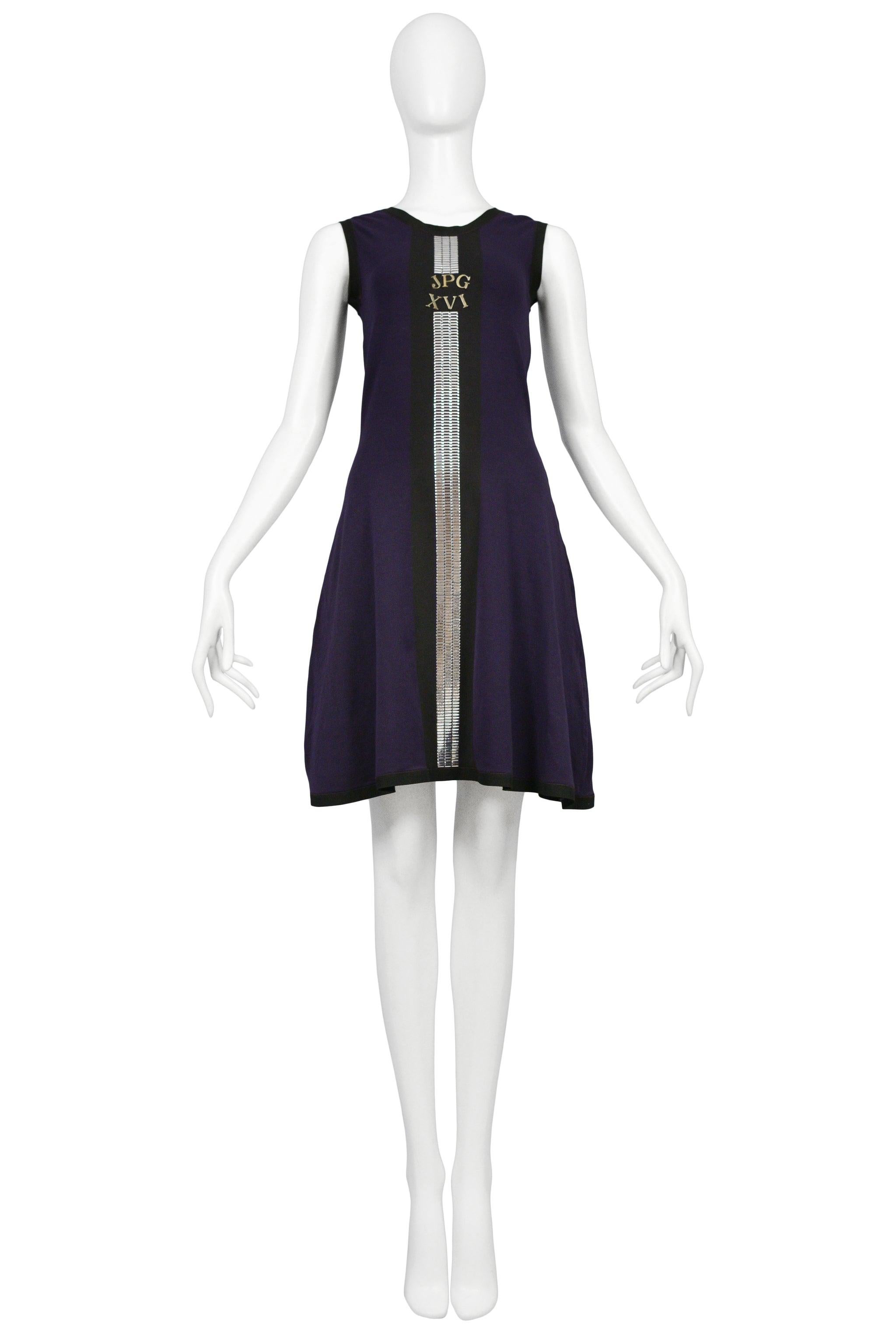 Resurrection Vintage is excited to offer a vintage Jean Paul Gaultier navy blue mini dress featuring a tank style, black trim silver letters and numbers, and silver rectangular detailing on the front.

Jean Paul Gaultier
Size S/M
Excellent Vintage