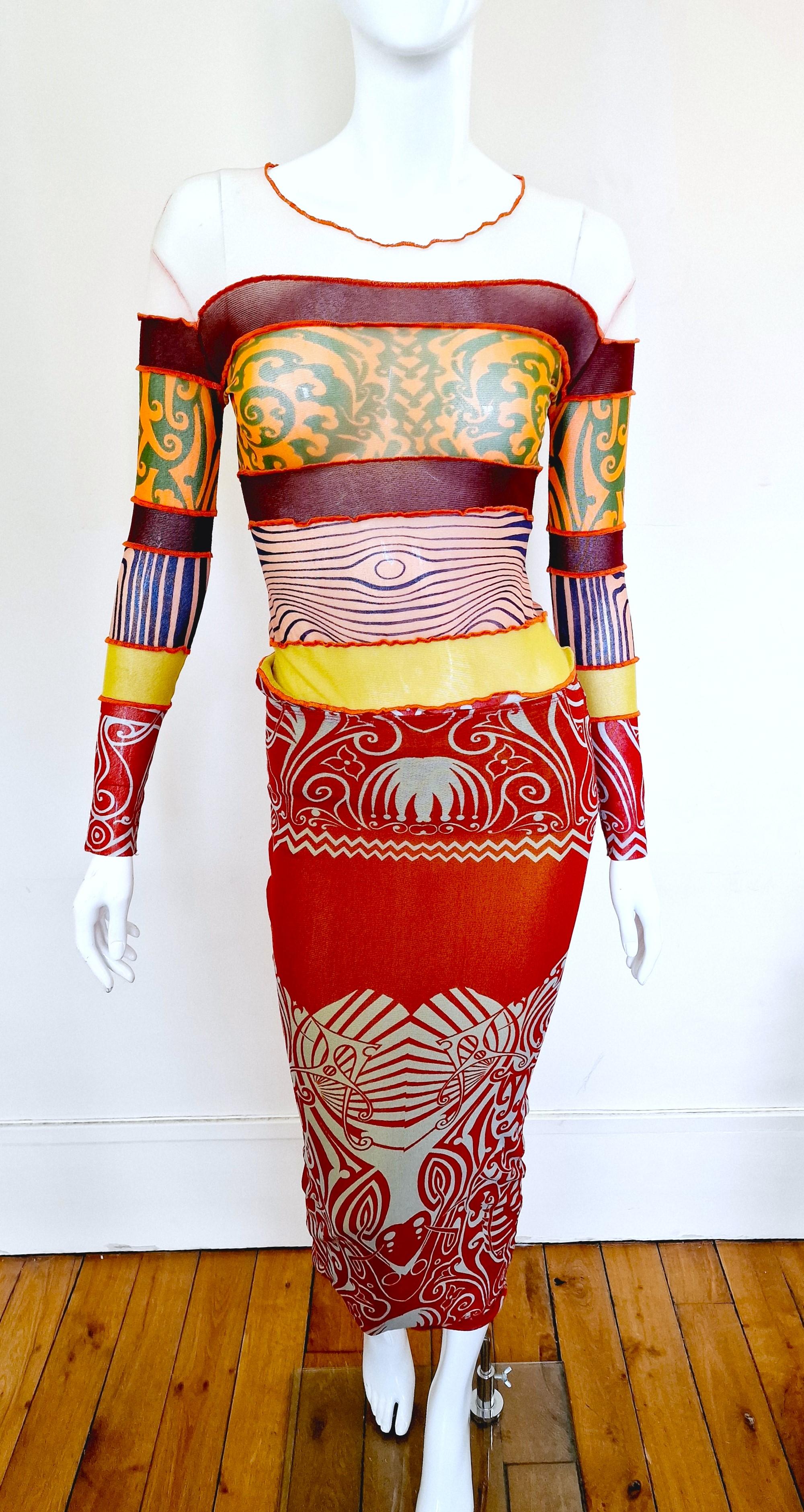 Iconic Optical Illusion Top + Skirt SET by Jean Paul Gaultier!
Worn by supermodel HELENA CHRISTENSEN at the JEAN PAUL GAULTIER Spring/Summer 1996 runway show.

JEAN PAUL GAULTIER Maille vintage iconic and rare Cyberbaba tattoo and body map optical
