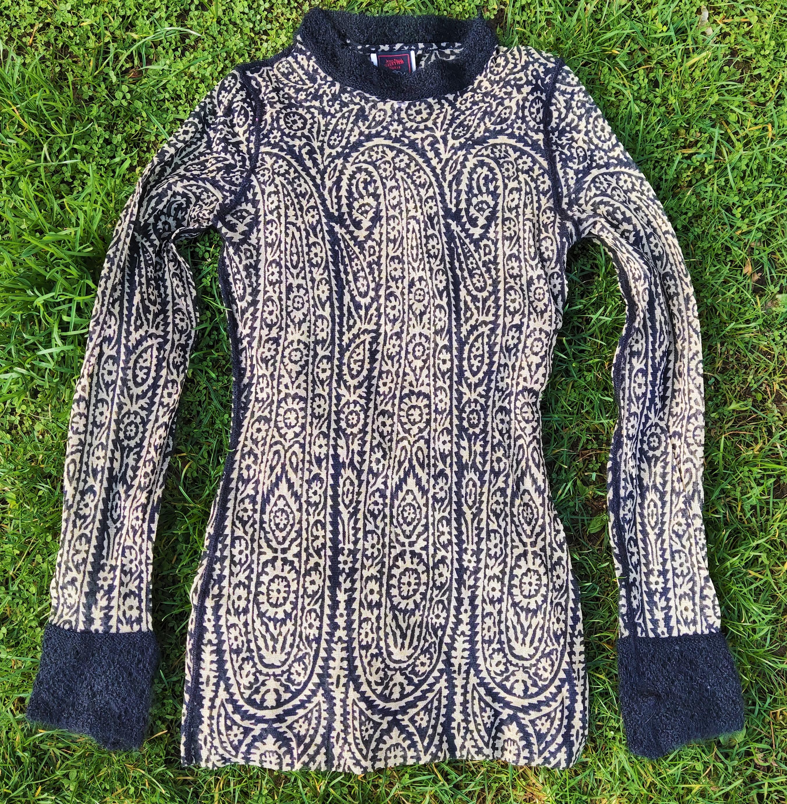 Paisley (Persian motif) mesh top by Jean Paul Gaultier! 
Transparent.

EXCELLENT Condition! 

SIZE: it fits from XS to medium (marked size: S). Extremly stretchy fabric!
Length:  64 cm / 25.2 inch
Armpit to armpit: 35 cm / 13.8 cm
Sleeve: 61 cm / 24