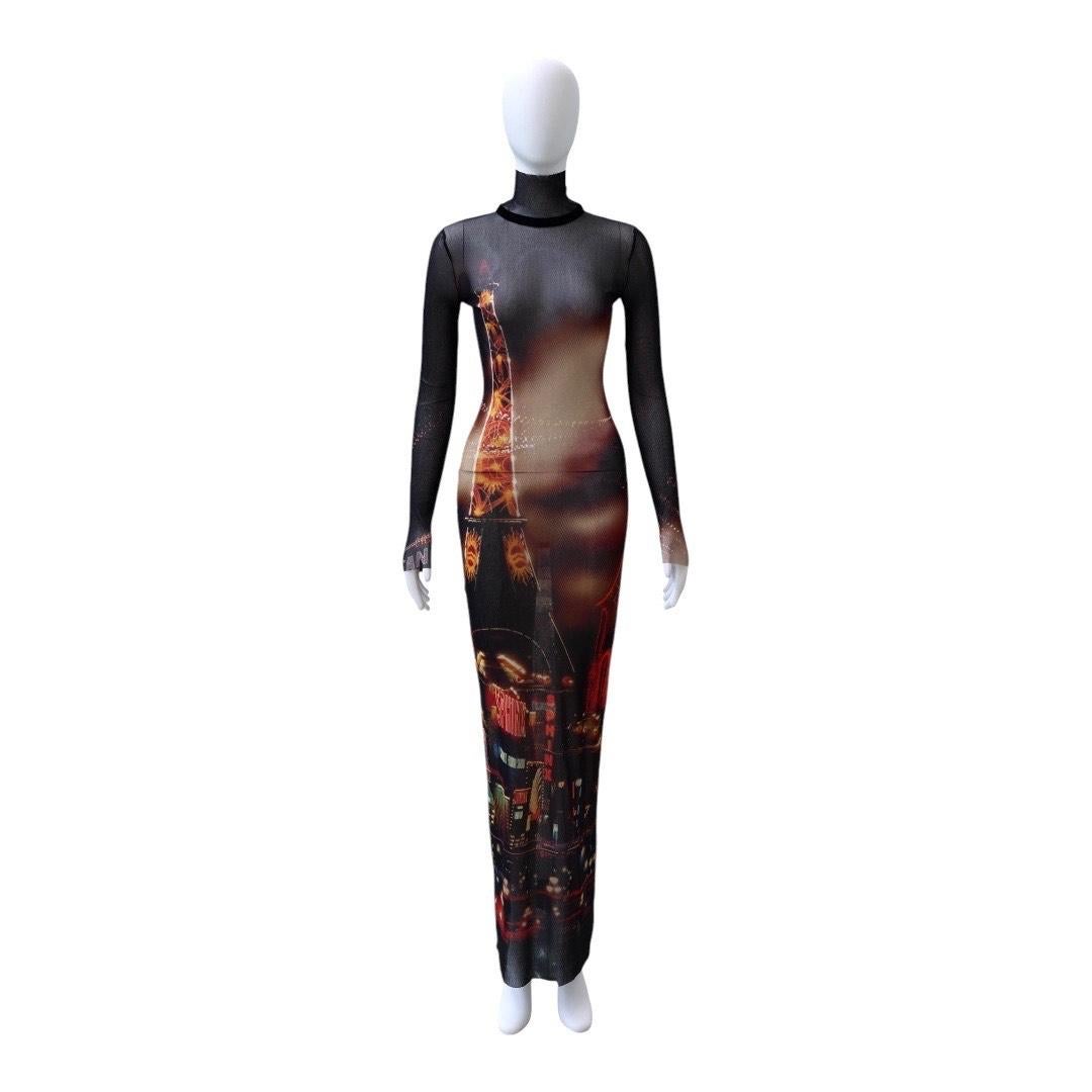 Jean Paul Gaultier Pigalle Printed Mesh Long Dress with Turtleneck

An iconic bodycon silhouette from the master of illusion - this Jean Paul Gaultier mesh maxi dress features a surreal, placed Pigalle cityscape print, creating a cinched, sculptural