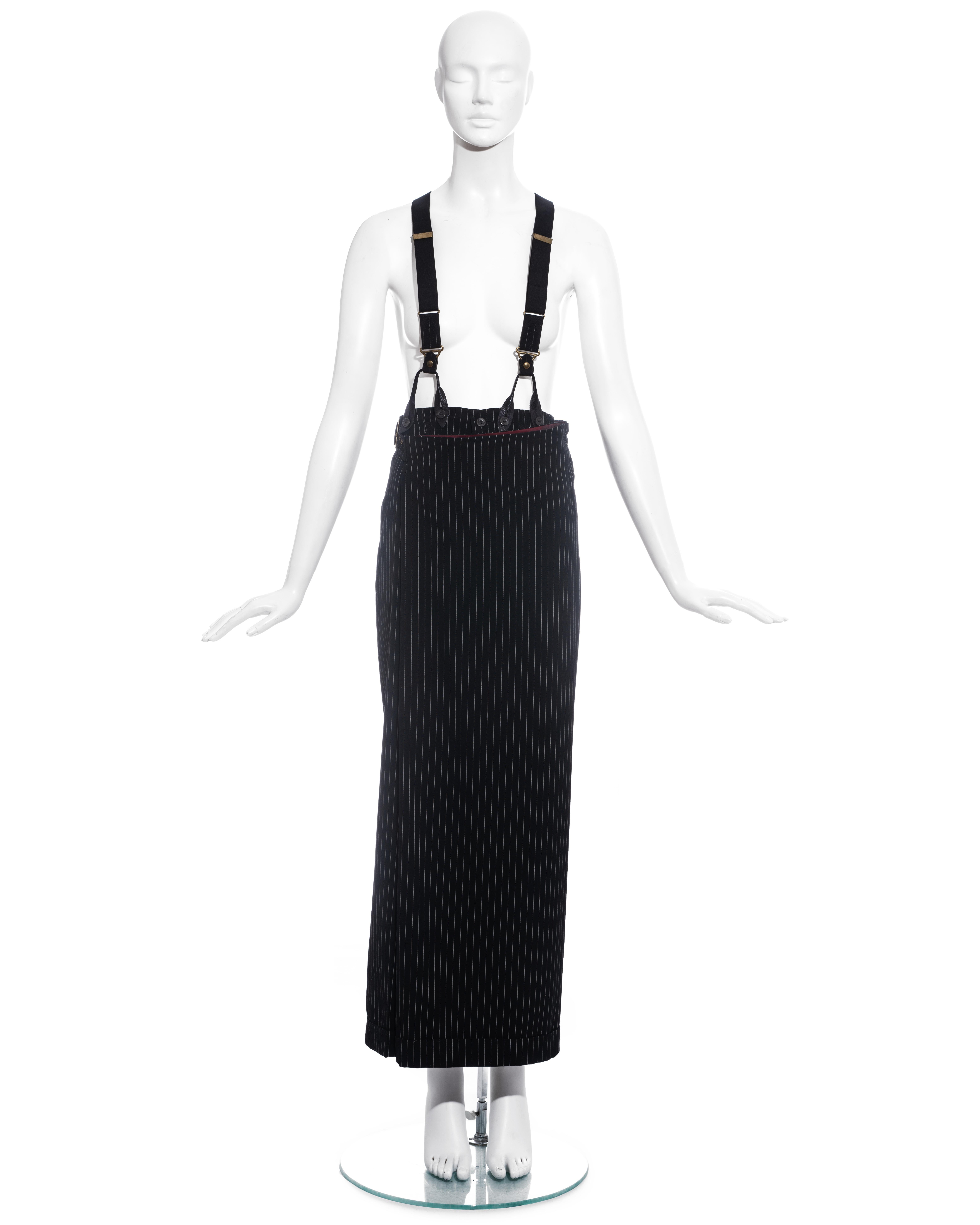 Jean Paul Gaultier pinstripe wool maxi wrap skirt / pants with matching suspenders. 

Fall-Winter 1993