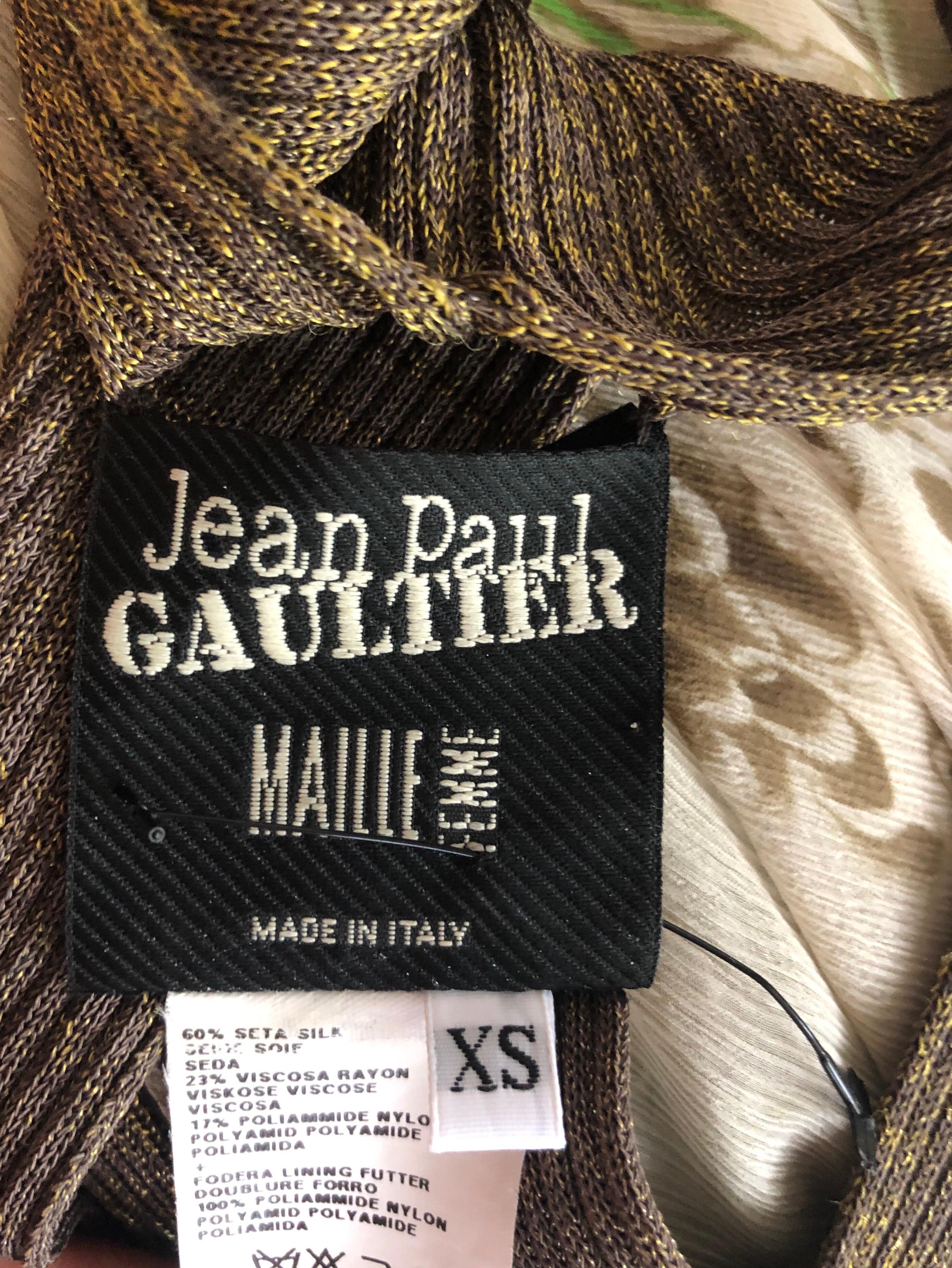 Jean Paul Gaultier S/S 2009 Runway Plunging Neckline Cutout Open Back Maxi Dress Size XS

Look 53 de la Collectional 2009. Robe longue à découpes Jean Paul Gaultier avec imprimé abstrait sur l'ensemble du corps, encolure dégagée et bordures en