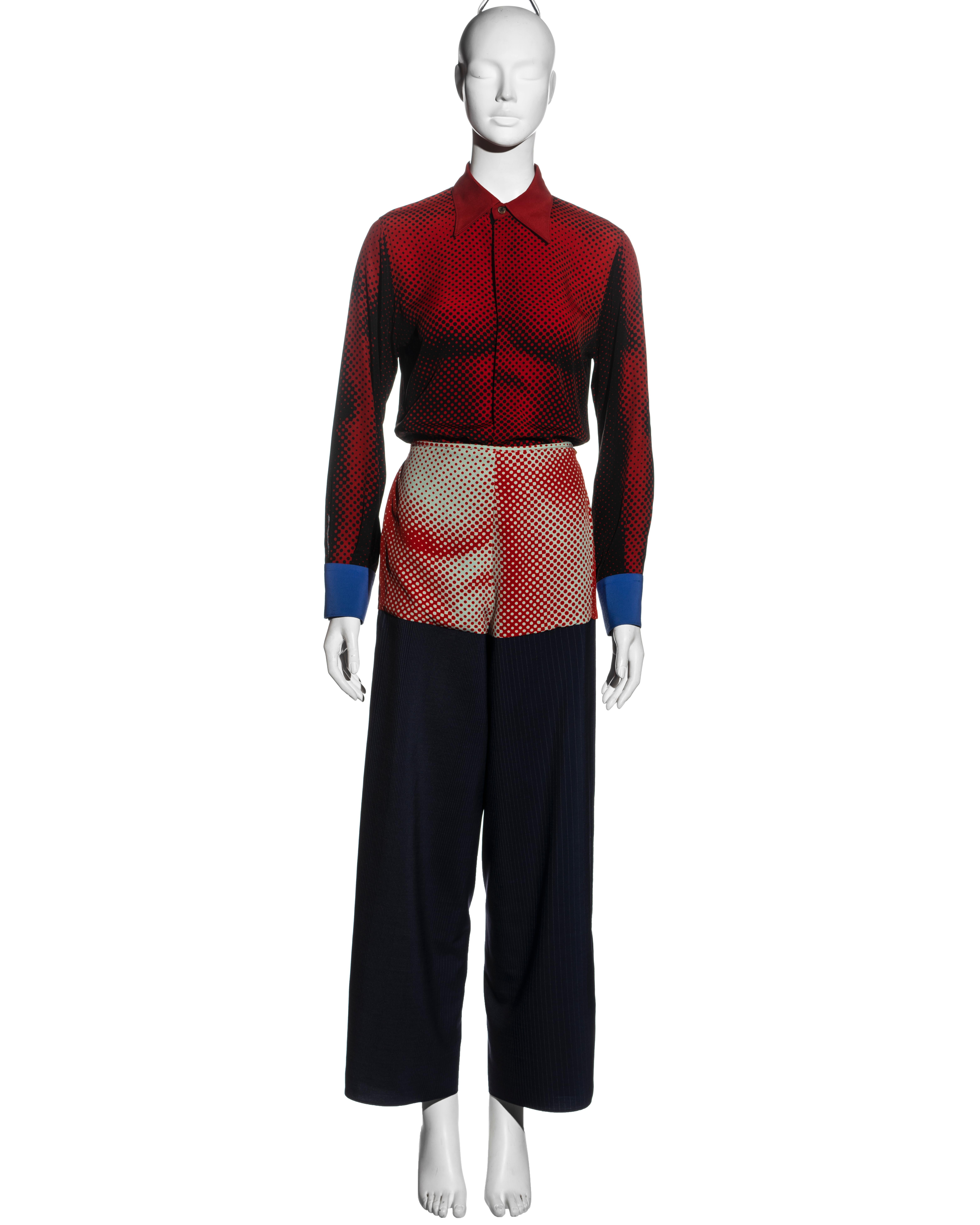 ▪ Jean Paul Gaultier red and navy 'cyber-hippe' pant suit 
▪ Red and black button-up shirt with trompe l'oeil print of a male torso 
▪ Blue cuffs 
▪ Wide-leg wrap patchwork wrap pants of pinstripe wool and a matching male torso print 
▪ Tan leather