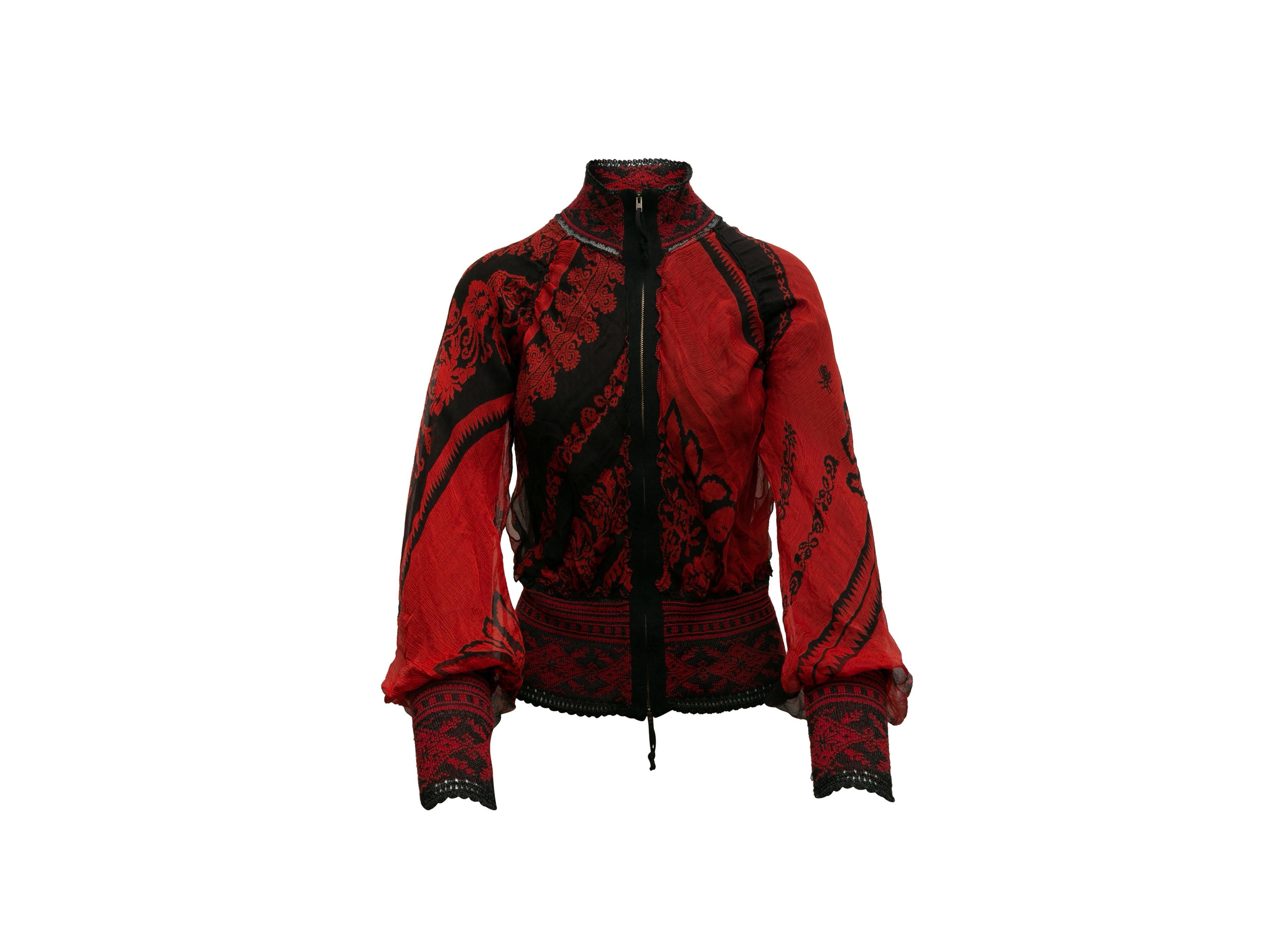 Product details: Vintage red and black silk jacket by Jean Paul Gaultier. Floral print throughout. Mock neck. Zip closure at center front. 30