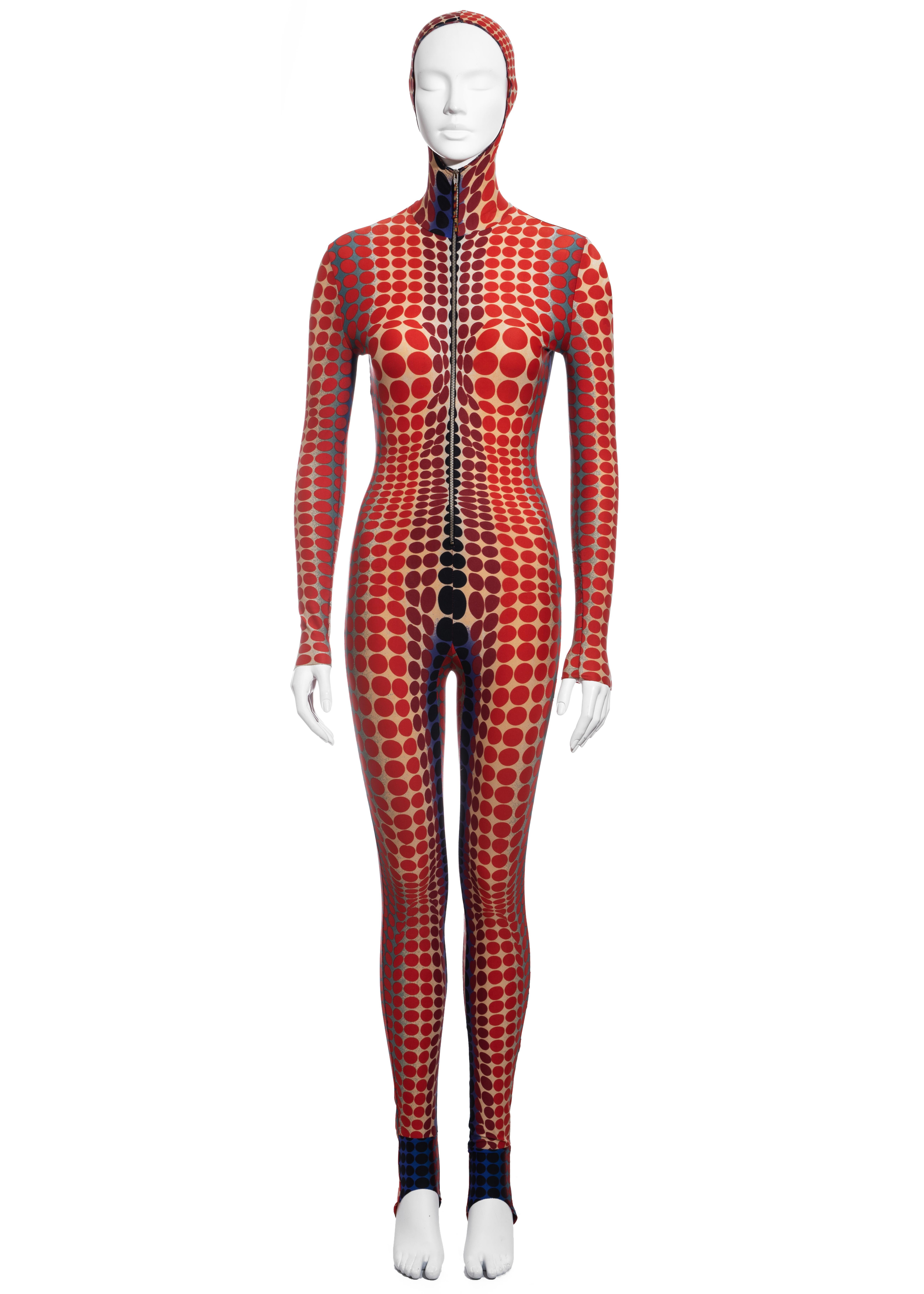 ▪ Jean Paul Gaultier red cyber dot catsuit  
▪ 78% Nylon, 22% Spandex 
▪ Victor Vasarely inspired print  
▪ Fitted hood 
▪ Front zip fastening  
▪ Size Medium 
▪ Fall-Winter 1995