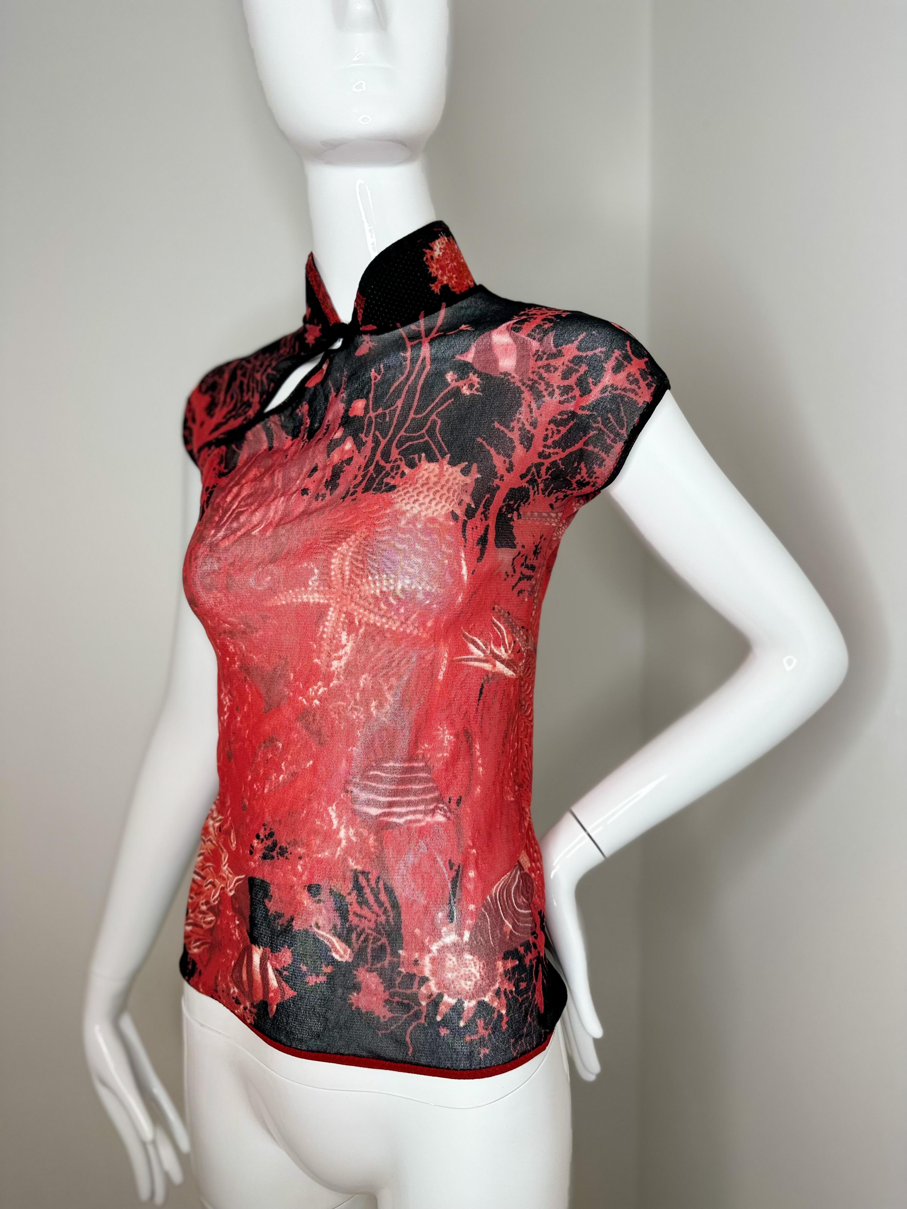 Vintage Jean Paul Gaultier red and black mesh top 
Size S
Good vintage condition: to rips, stains or snags 

Approx. flat measurements: 
Pit to pit: 14.5 inches 
Length: 21.5 inches 
Shoulder to shoulder: 15 inches 