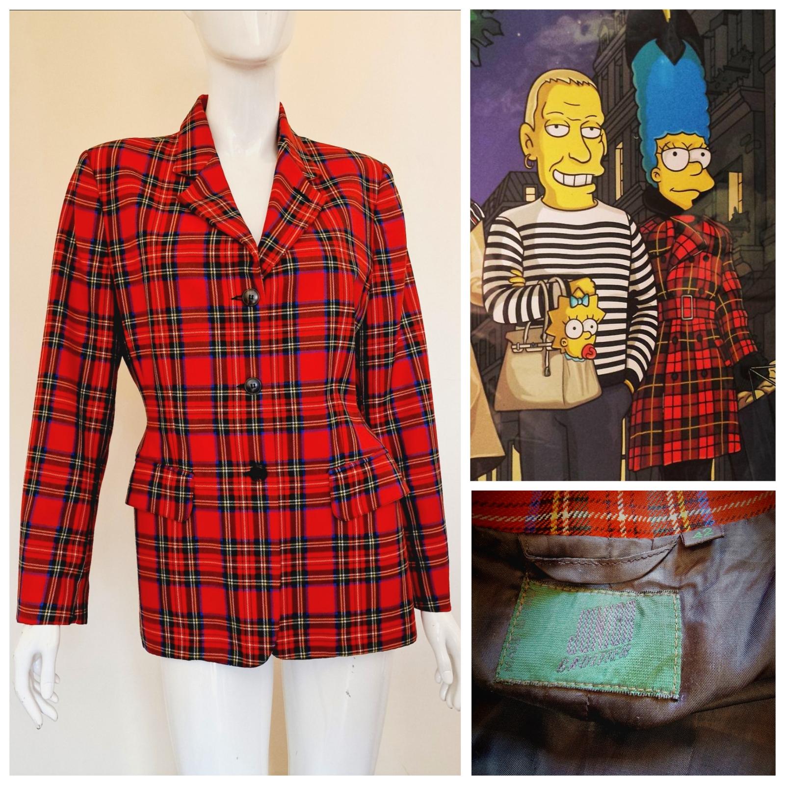 Jean Paul Gaultier red tartan wool blanket jacket. Structured blazer jacket with three button closures, two front flap pockets, accentuated waist and wide hips (wasp waist). With shoulder pads.
100% wool.

EXCELLENT Condition!

SIZE
Marked size: