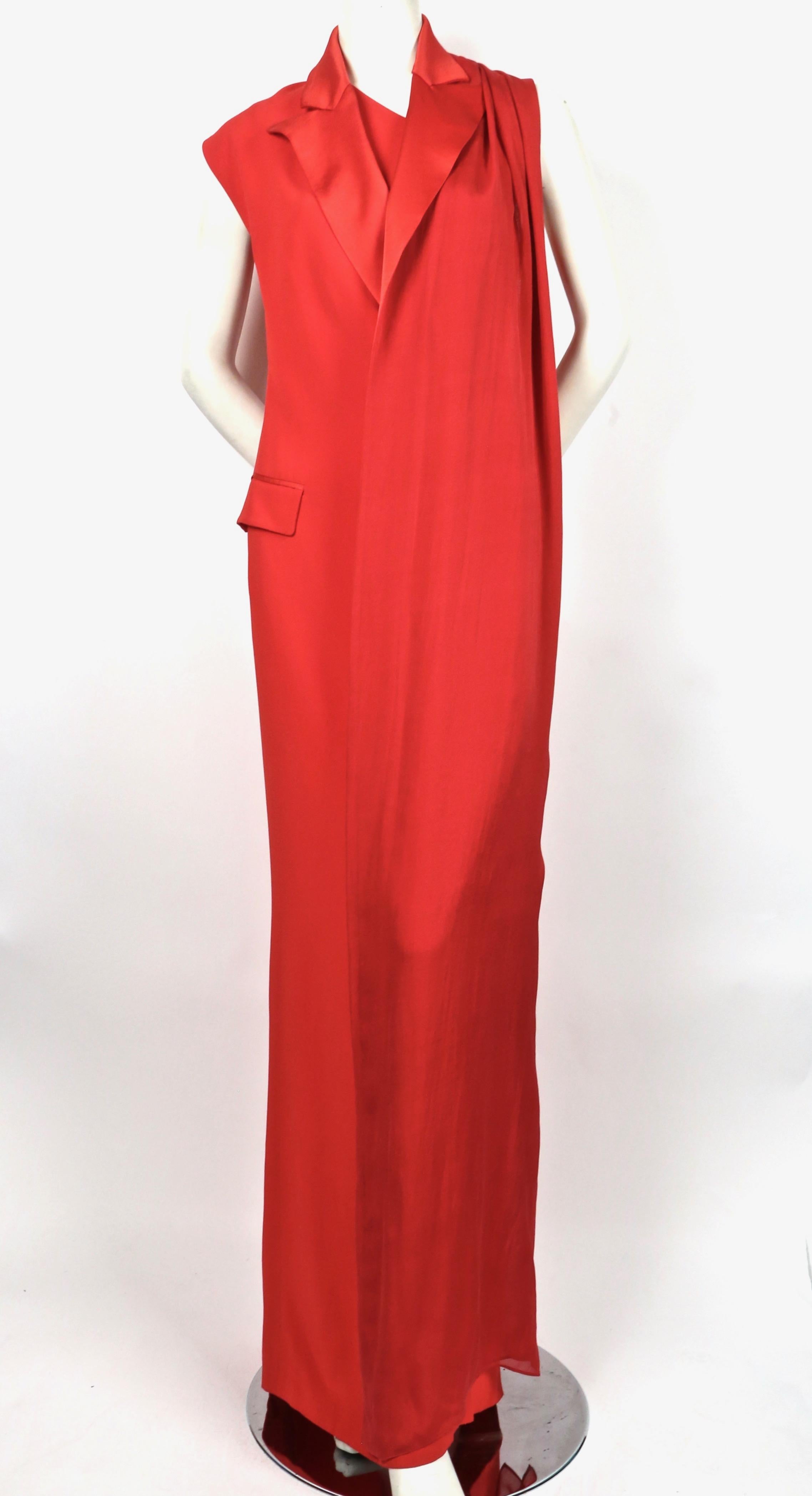 Red tuxedo gown with satin trim and draped silk scarf designed by Jean Paul Gaultier. Labeled a French size 34. Approximate measurements: 32