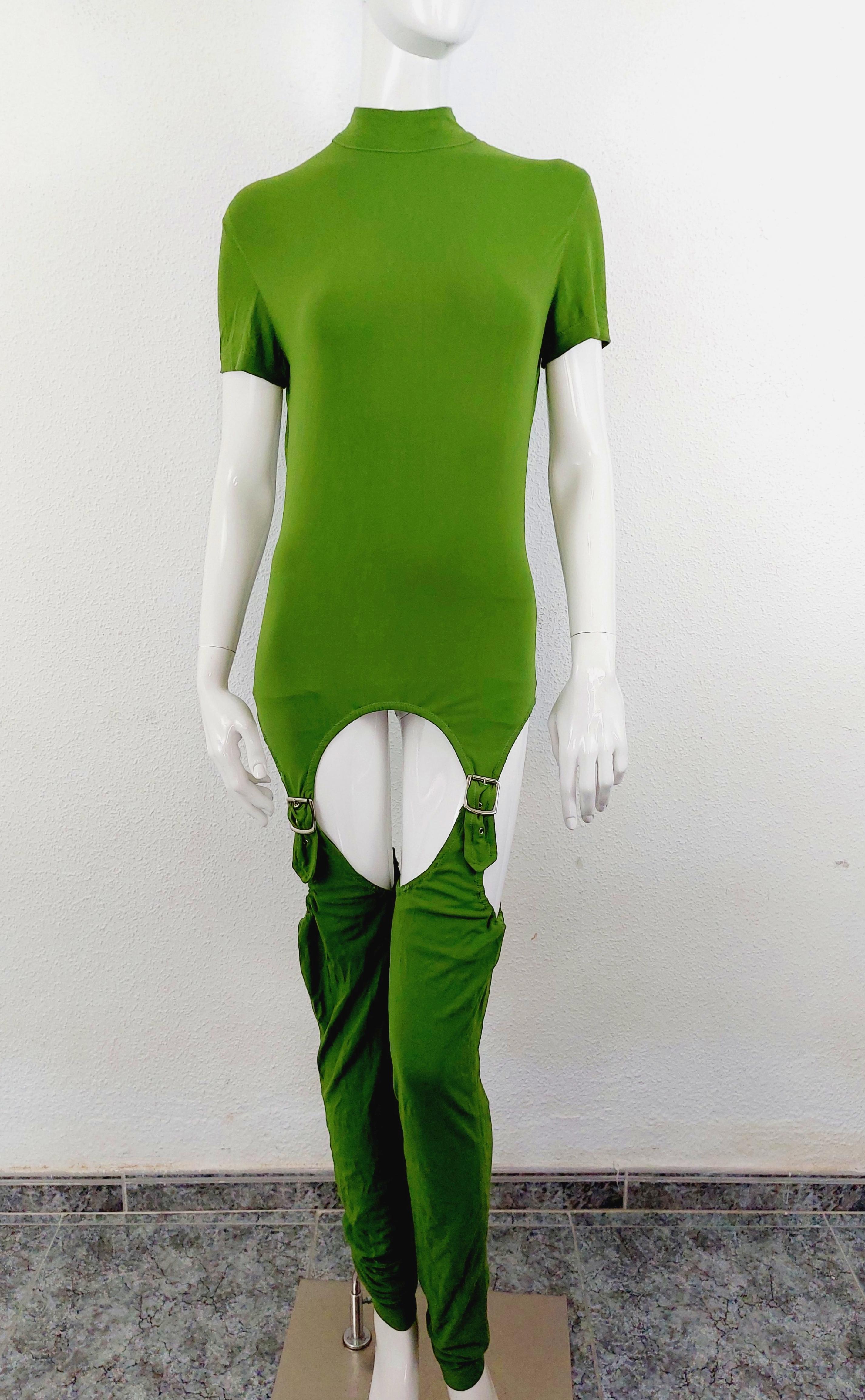 Jean Paul Gaultier Runway 1998 SS Maniacs’ Collection Green Cutout Nude Kinky Open Genitals Drag Bodysuit Anorak Suit

Unique cut out bodysuit with adjustable leg warmers, from the 1992 Maniac’s Collection.
Collector/Museum Piece.

Very good