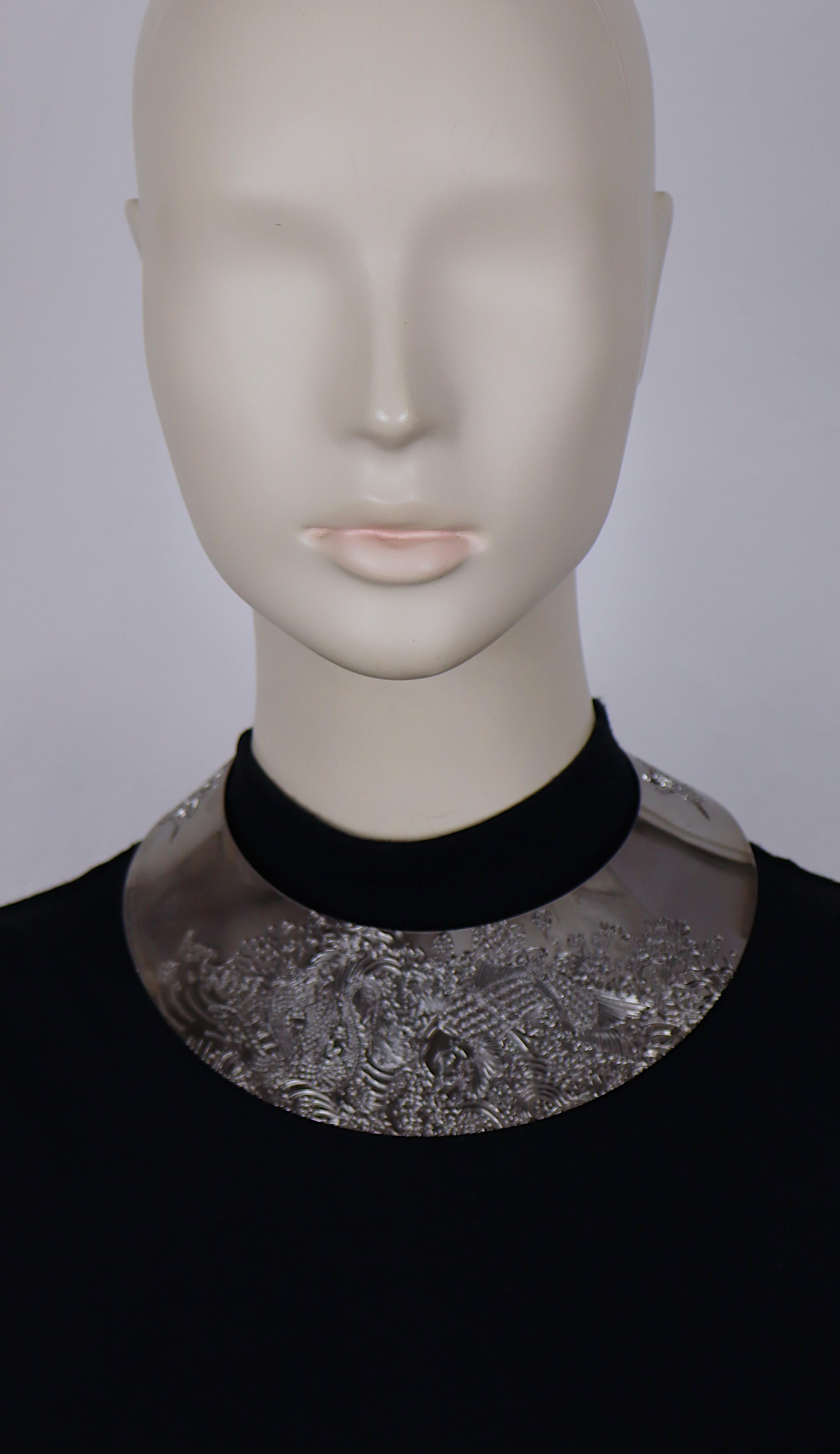 JEAN PAUL GAULTIER ruthenium color choker necklace featuring a Japanese inspired koi fish tattoo engraving.

Embossed JEAN PAUL GAULTIER.

Indicative measurements : inner circumference approx. 36.13 cm (14.22 inches) / neck opening approx. 8.9 cm