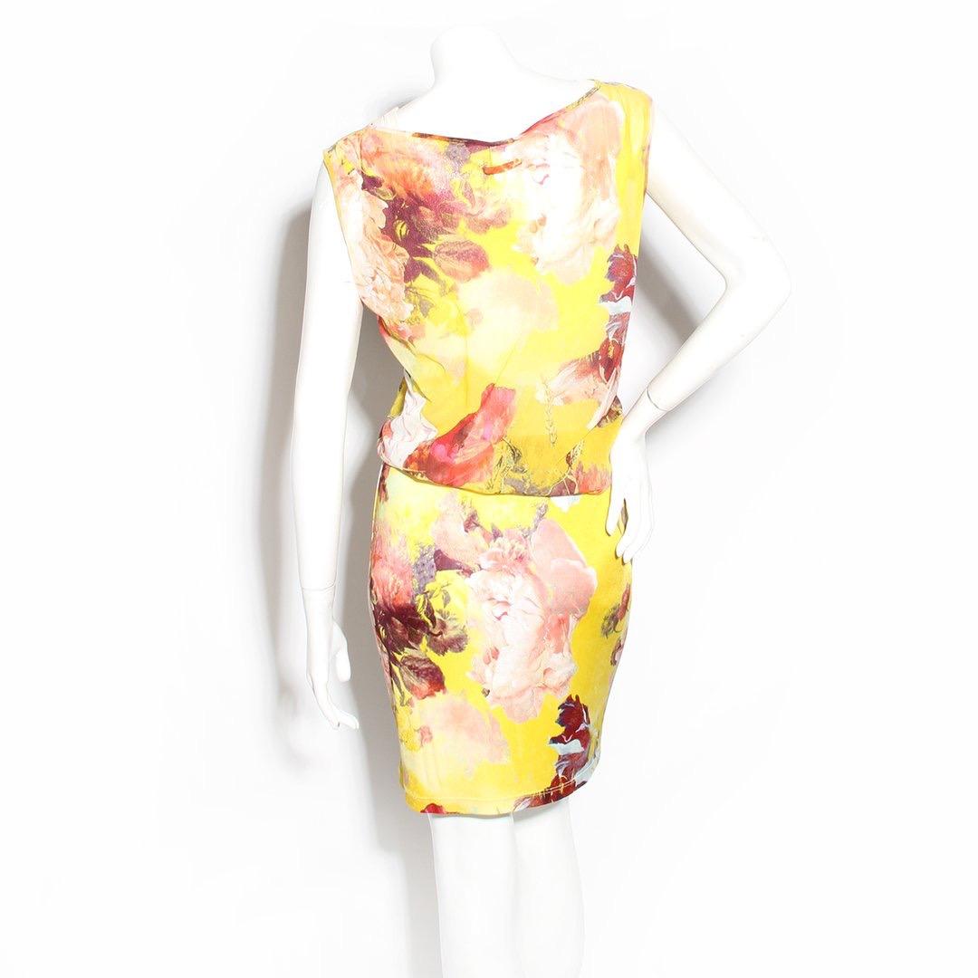 Yellow floral print dress by Jean Paul Gaultier 
Spring/Summer 2006 
Nylon mesh layers
Multicolored floral print 
Draped waist
Slip-on
Sleeveless
Made in Italy
Condition: Excellent, little to no visible wear (see photos)

Size/Measurements:
