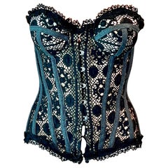 Jean Paul Gaultier Jeans P/E 2006: top trasparente nero con corsetto e pizzo