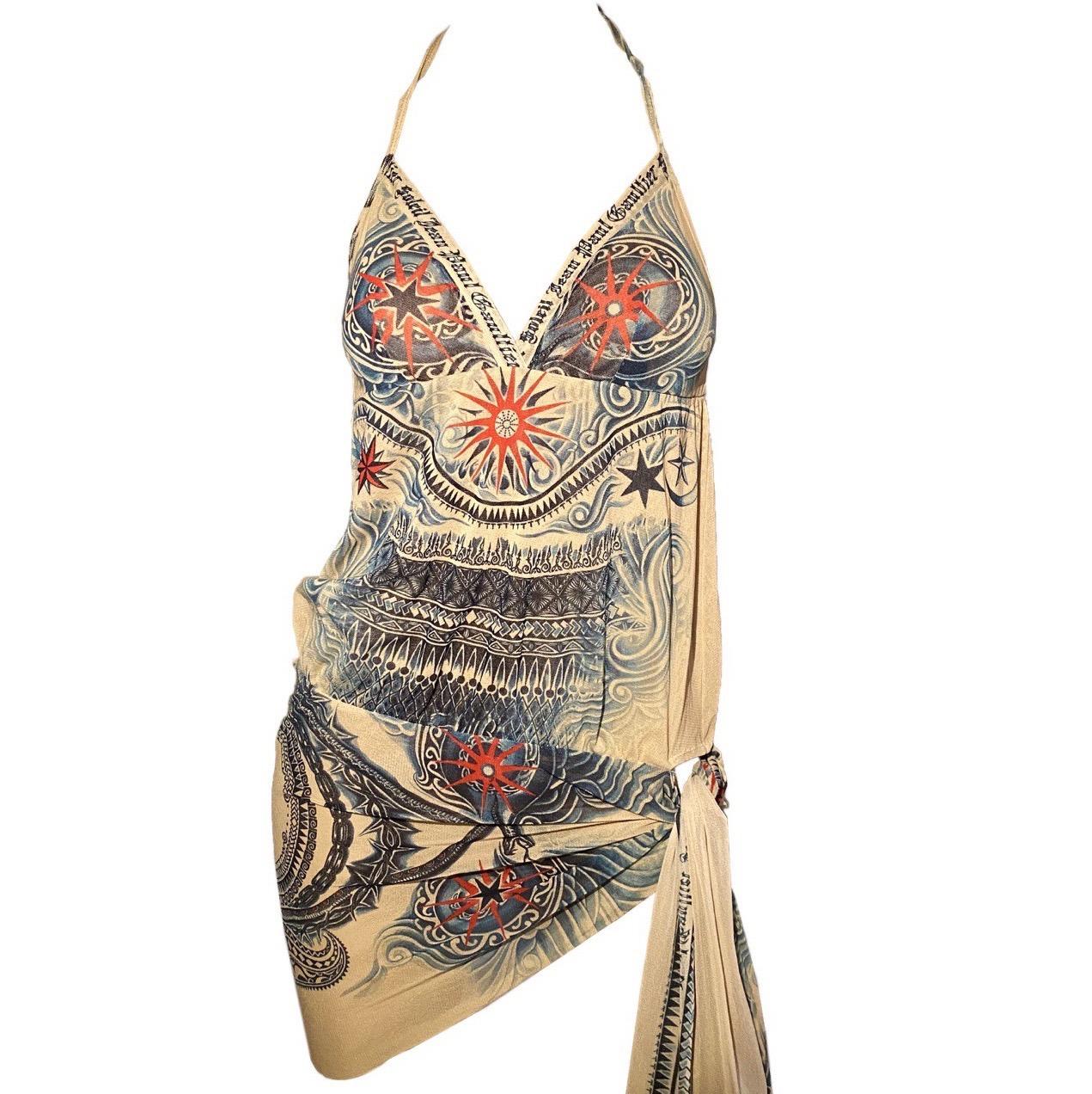 Jean Paul Gaultier Soleil Nude Mesh Halter Dress with iconic Blue and Red Tribal Dragon Print from the S/S 09 collection

Size M

Pit to Pit – 33 cm / 12,9 inches 
Length – 60 / 23,6 inches 
