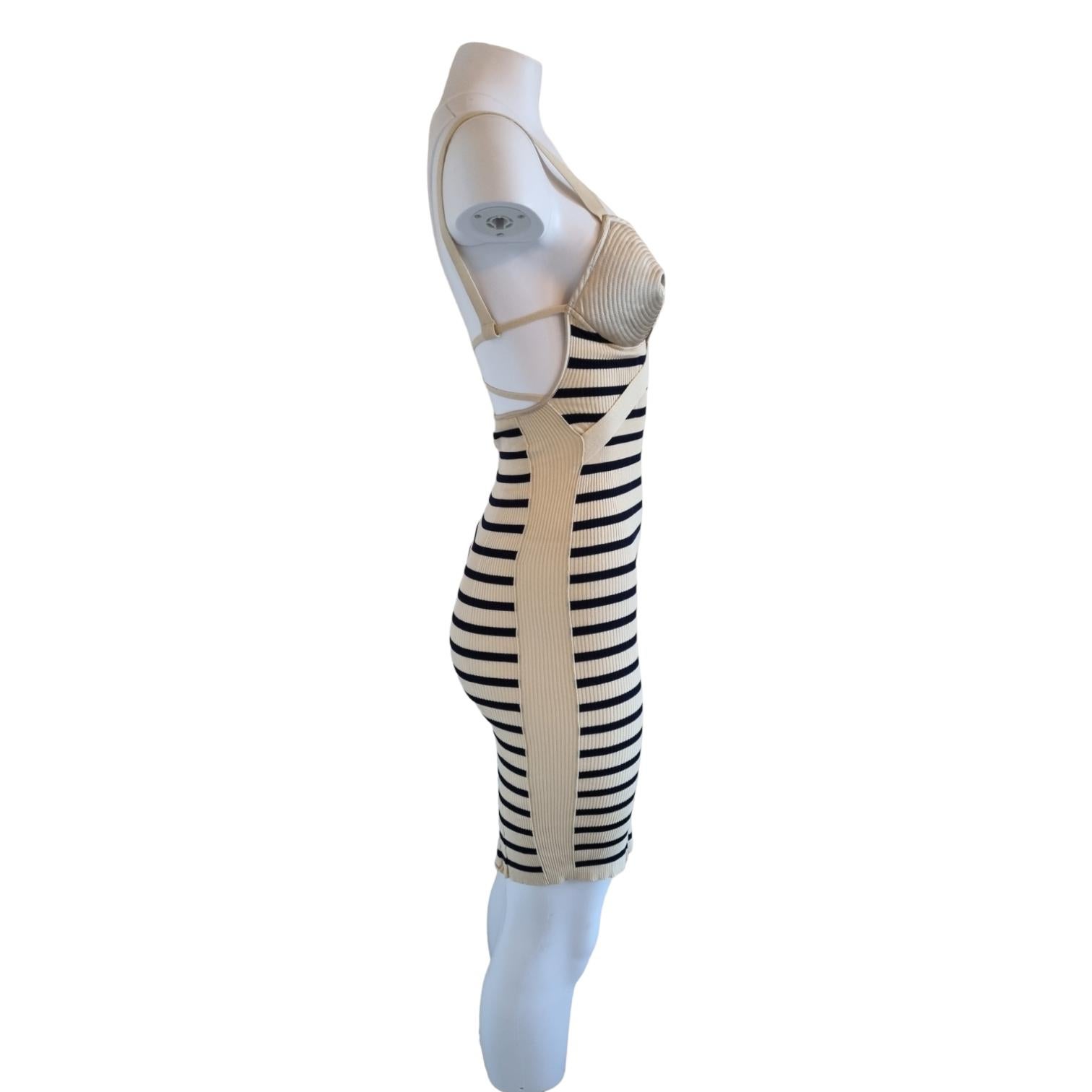 My Runway Archive presents this Iconic Jean Paul Gaultier 'Maille' dress that fuses two of Gaultier's most signature styles. 
Cones and sailor stripes.
Size: Medium
Condition: Excellent
Material: Cotton, Viscose and Nylon 
Follow us on Insta -