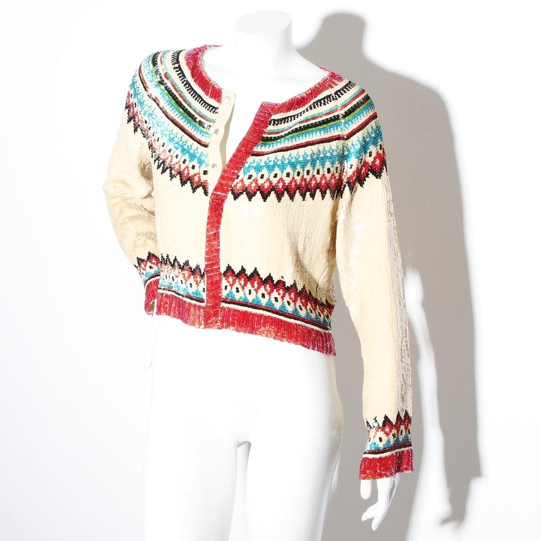 Product Details:
Sequin Cardigan by Jean Paul Gaultier 
Circa 1990's 
Multicolor sequin 
Pink sequin trim 
Snap front closure 
55% Polyester, 45% Silk 
Made in Italy 
Condition: Great, some missing and loose sequins (see