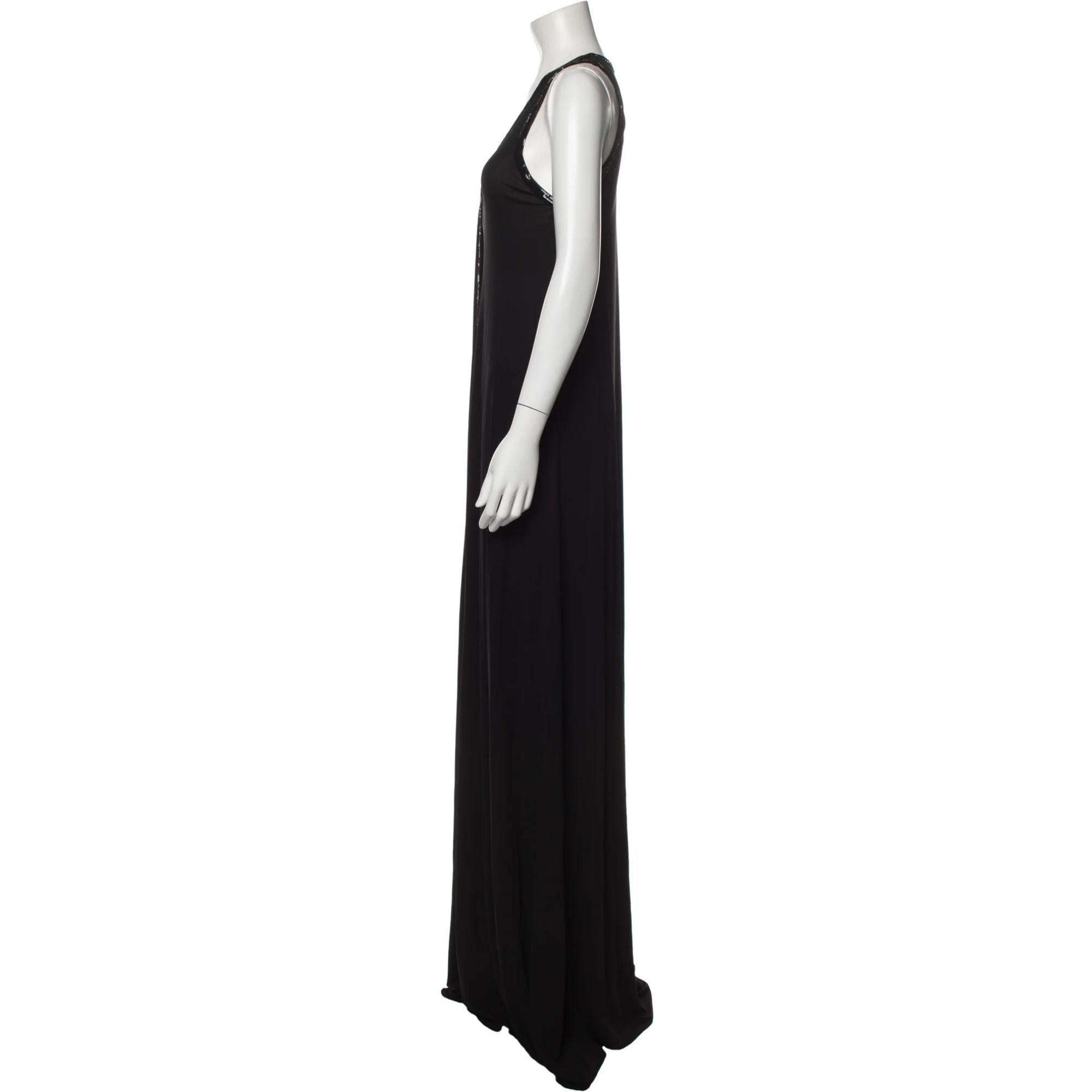 Jean Paul Gaultier Evening Gown. Vintage. From the 2000's Collection by Jean Paul Gaultier. Black. Sequin Embellishments. Long Sleeve with Scoop Neck. Sash-Tie Closure at Front. Designer Fit: Dresses by Jean Paul Gaultier are typically designed for