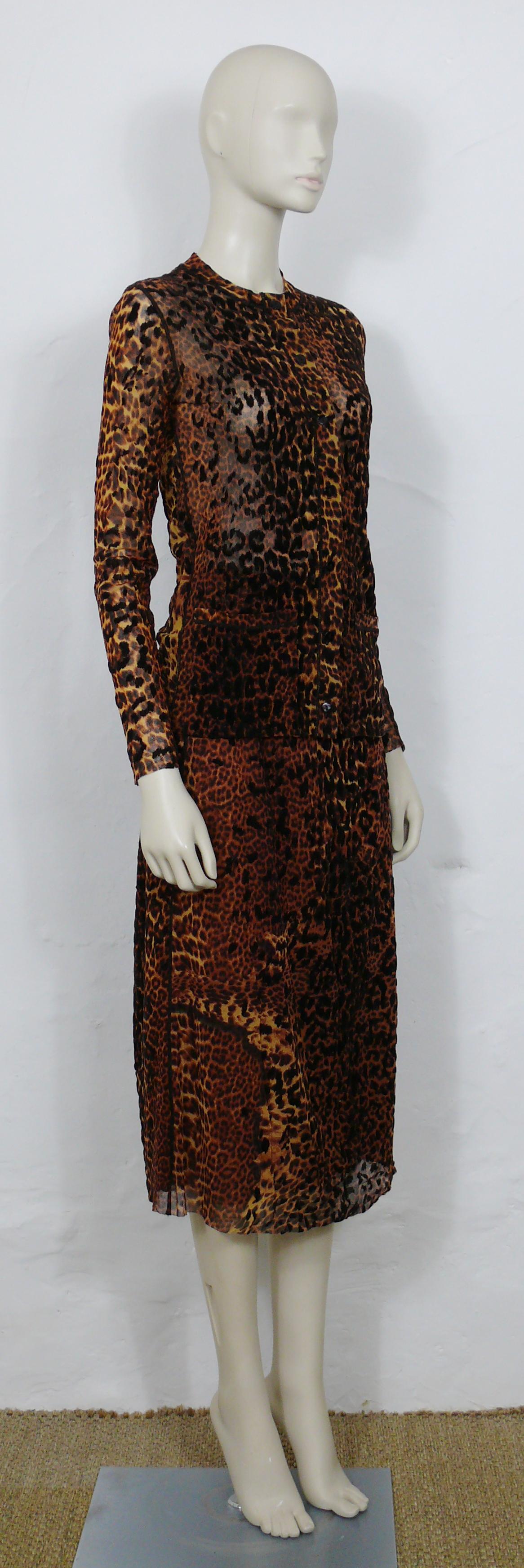 JEAN PAUL GAULTIER FUZZI sheer mesh cheetah print ensemble including a cardigan and a skirt.

CARDIGAN features :
- FUZZI sheer mesh cheetah print fabric with flocked velvet.
- Front button down closure.
- Visible stitching.
- Long sleeves.
- Two
