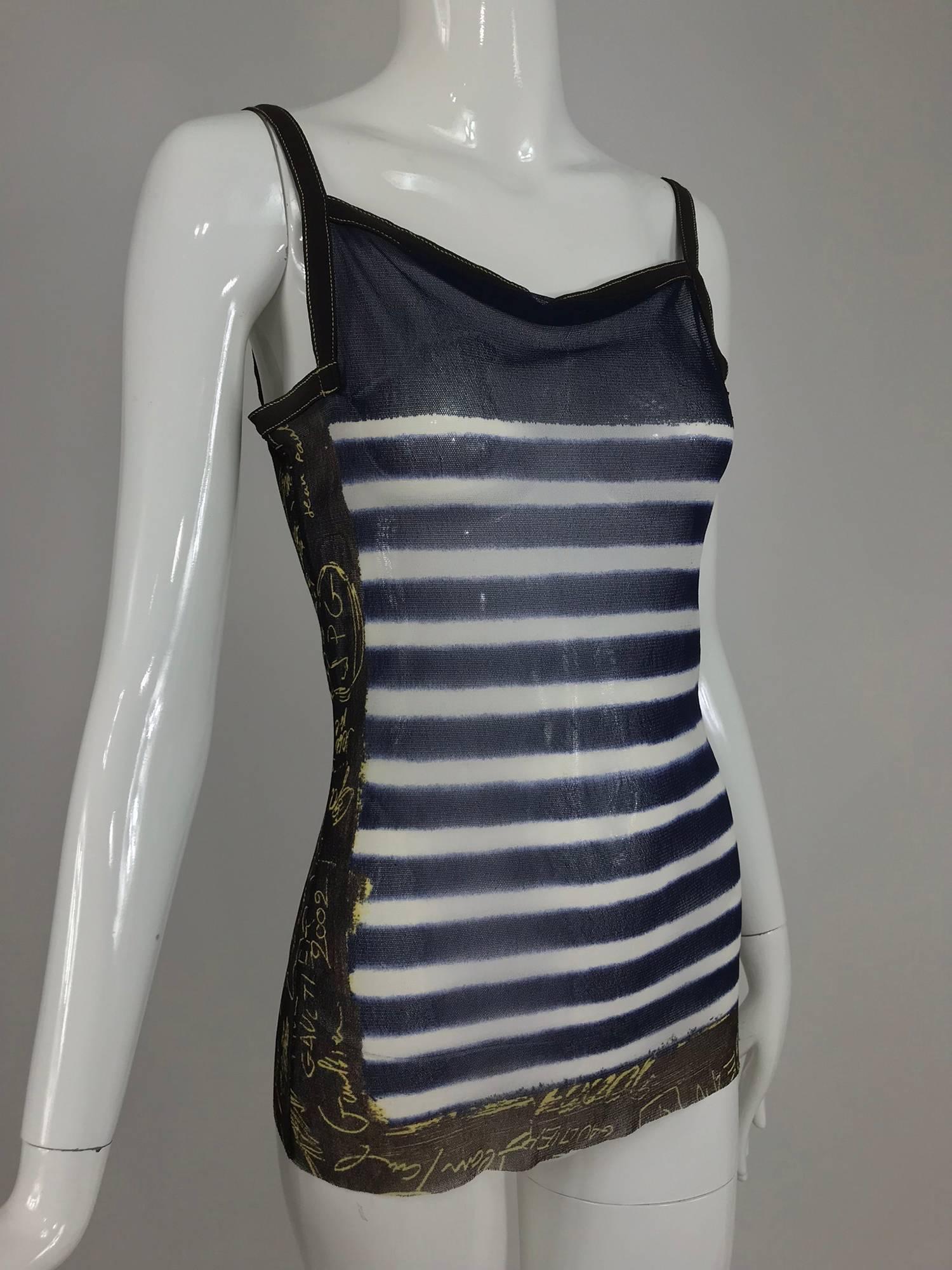 Jean Paul Gaultier nautical stripe tank top signed and dated 2001-2002. Mesh top has higher neck front and back with square shape arm openings...Blue and white stripe with vertical bands of brown and white at the sides with signed dated print.