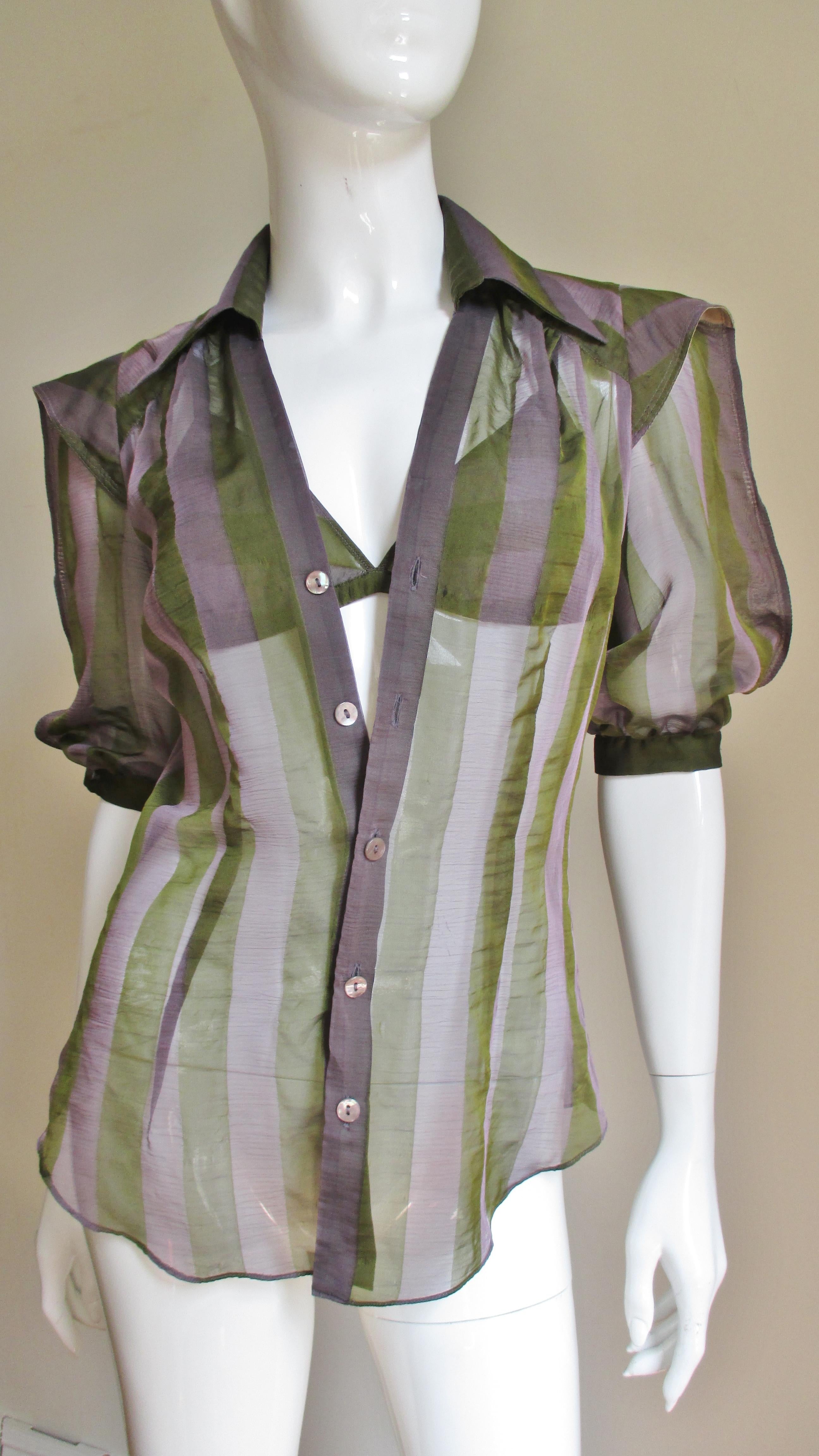 A fabulous matching shirt and bra set in olive and purple striped silk by Jean Paul Gaultier.  The princess seam shirt has fabulous full elbow length sleeves with button cuffs from extended shoulder detail.  It has a shirt collar and buttons up the