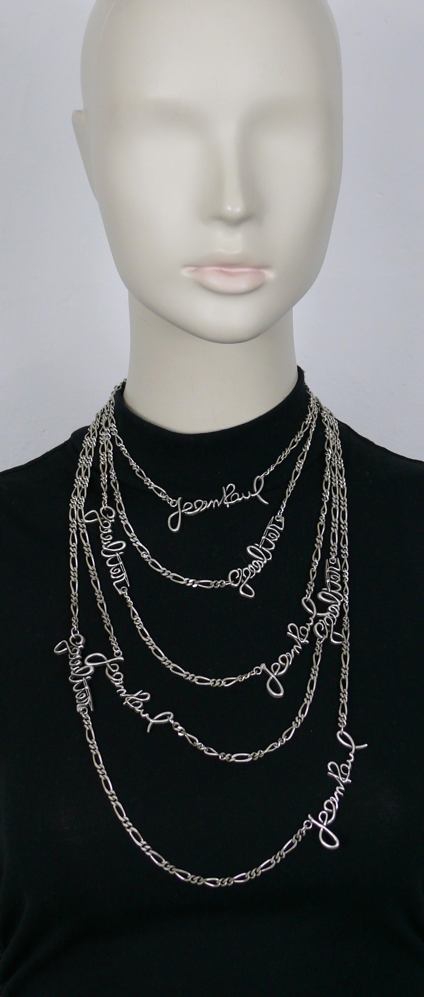 JEAN PAUL GAULTIER antiqued silver tone five strand chain necklace featuring JEAN PAUL GAULTIER cursive signatures.

Lobster clasp closure.
Adjustable length.

Unmarked.

Indicative measurements : adjustable length from approx. 33 cm (12.99 inches)