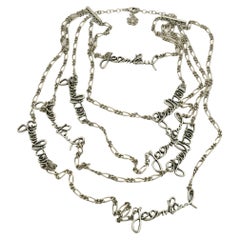 Used JEAN PAUL GAULTIER Silver Tone Cursive Signature Multi-Strand Necklace