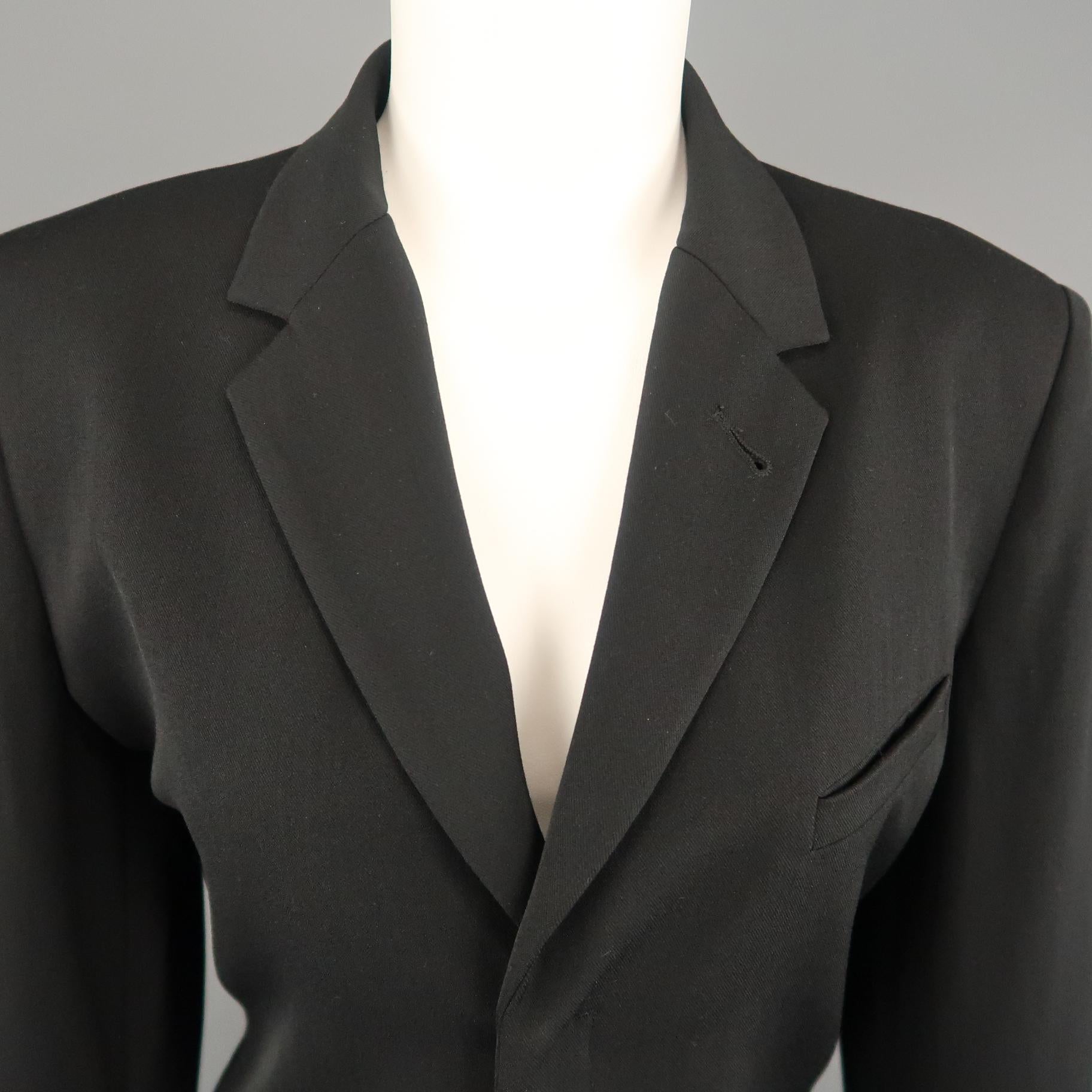 Vintage JEAN PAUL GAULTIER blazer comes in black twill with a notch lapel, hidden placket zip front, and distressed leather belted zip off cuffs. Made in Italy.
 
Excellent Pre-Owned Condition.
Marked: 12
 
Measurements:
 
Shoulder: 16 in.
Bust: 42