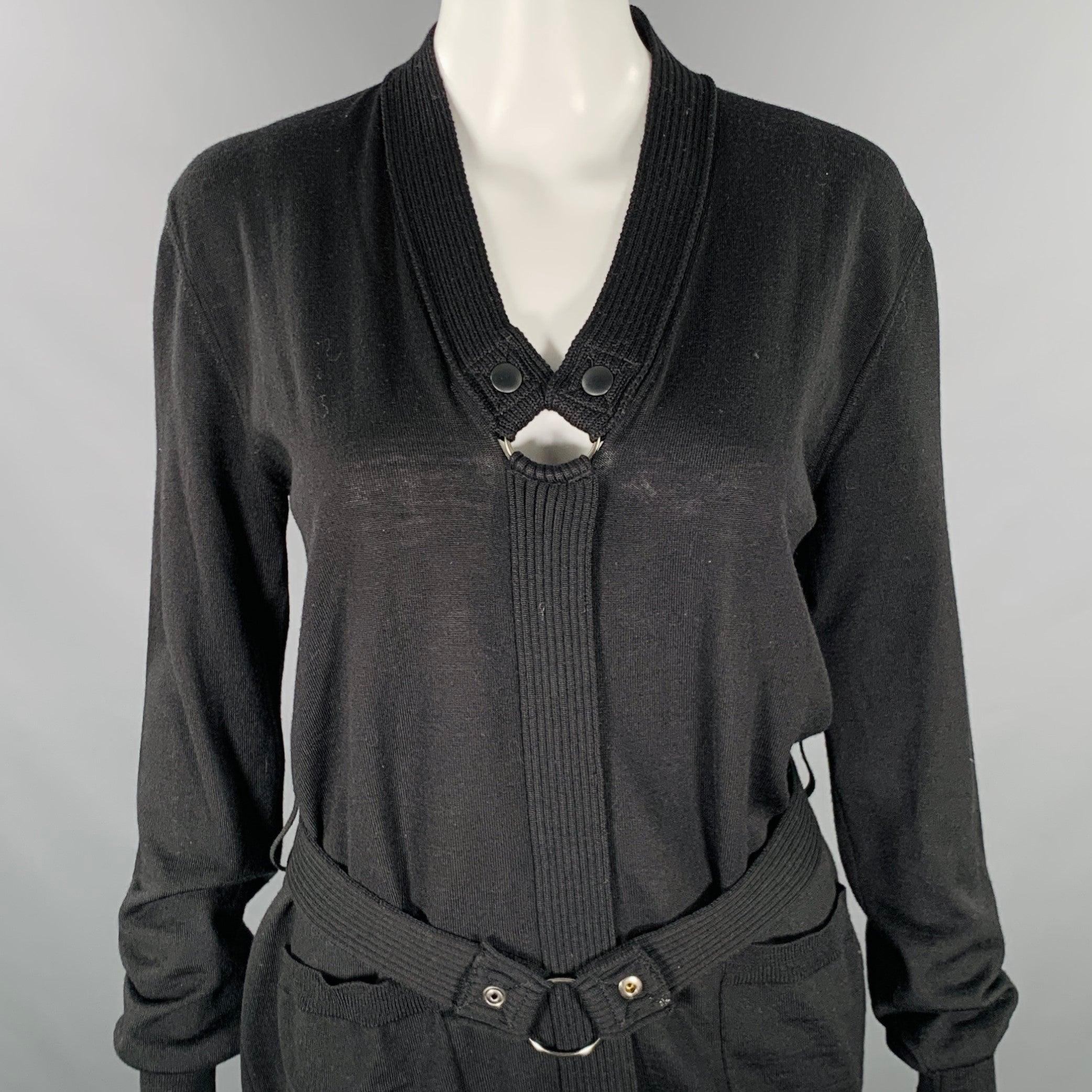 JEAN PAUL GAULTIER pullover
in a black fabric knit featuring a belted style with O-ring details at neck and waist, long slekeves, and V-neck.
Made in Italy.Excellent Pre-Owned Condition. 

Marked:   size not marked. Tags removed. 

Measurements: 
