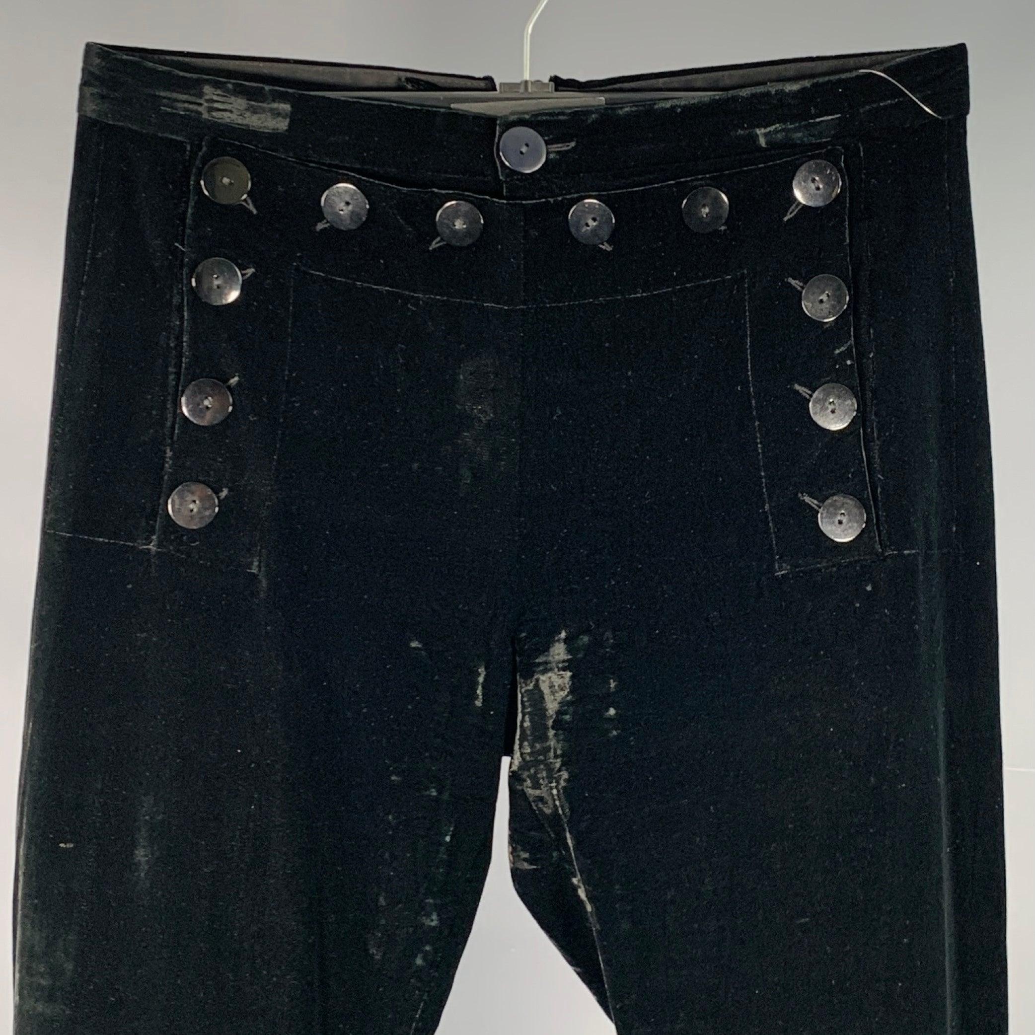 GAULTIER 2 by JEAN PAUL GAULTIER dress pants
in a black rayon silk blend velvet featuring a flared leg, back lace-up detail, and front bib button closure. Made in Italy.Very Good Pre-Owned Condition. Minor marks and signs of wear. 

Marked:   M