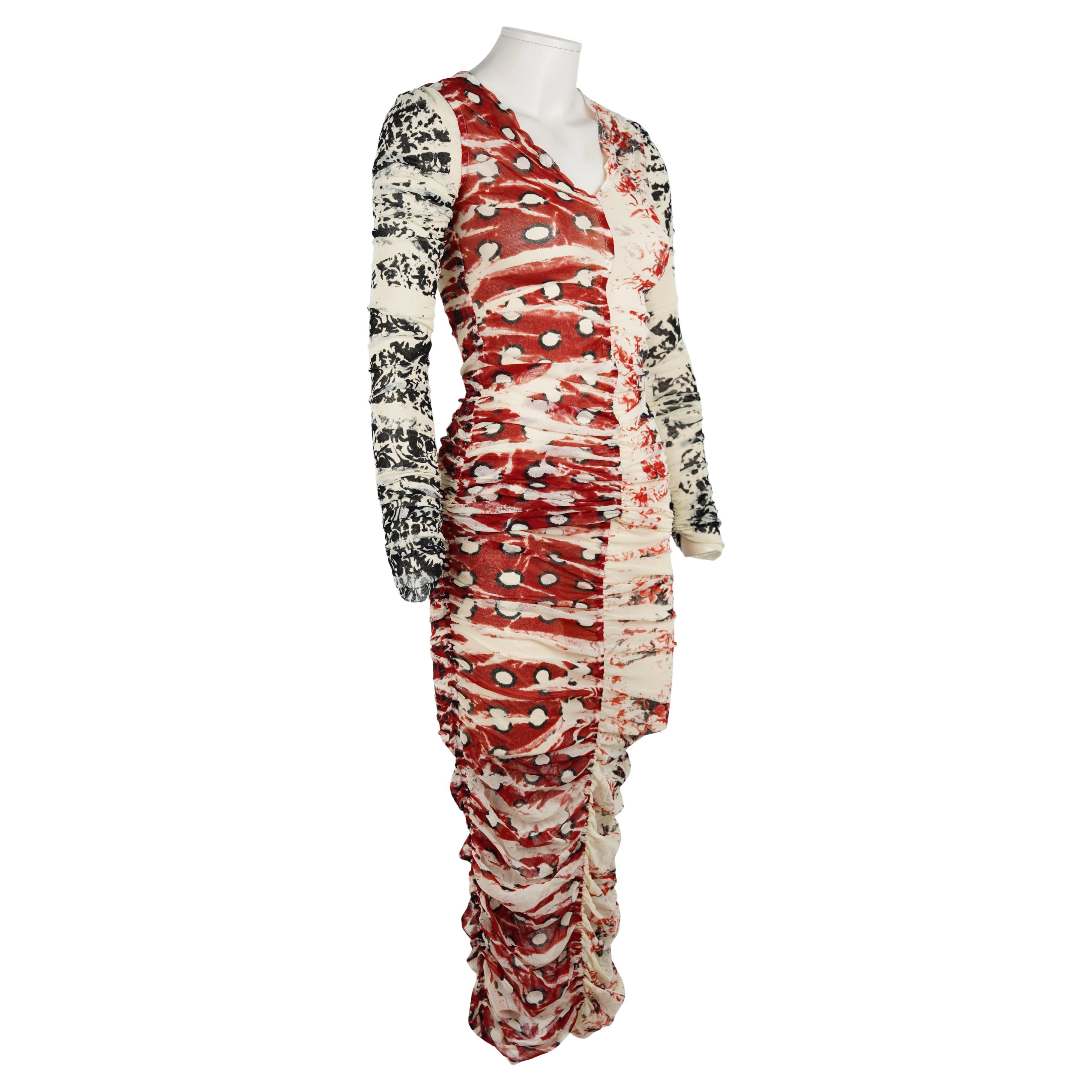Dieses seltene zweiteilige Jean Paul Gaultier Soleil Set zeigt die kühne Verwendung von Drucken und figurbetonten Silhouetten des Designers. Das in Italien vom renommierten Textilunternehmen Fuzzi gefertigte Set besteht zu 100 % aus leichtem