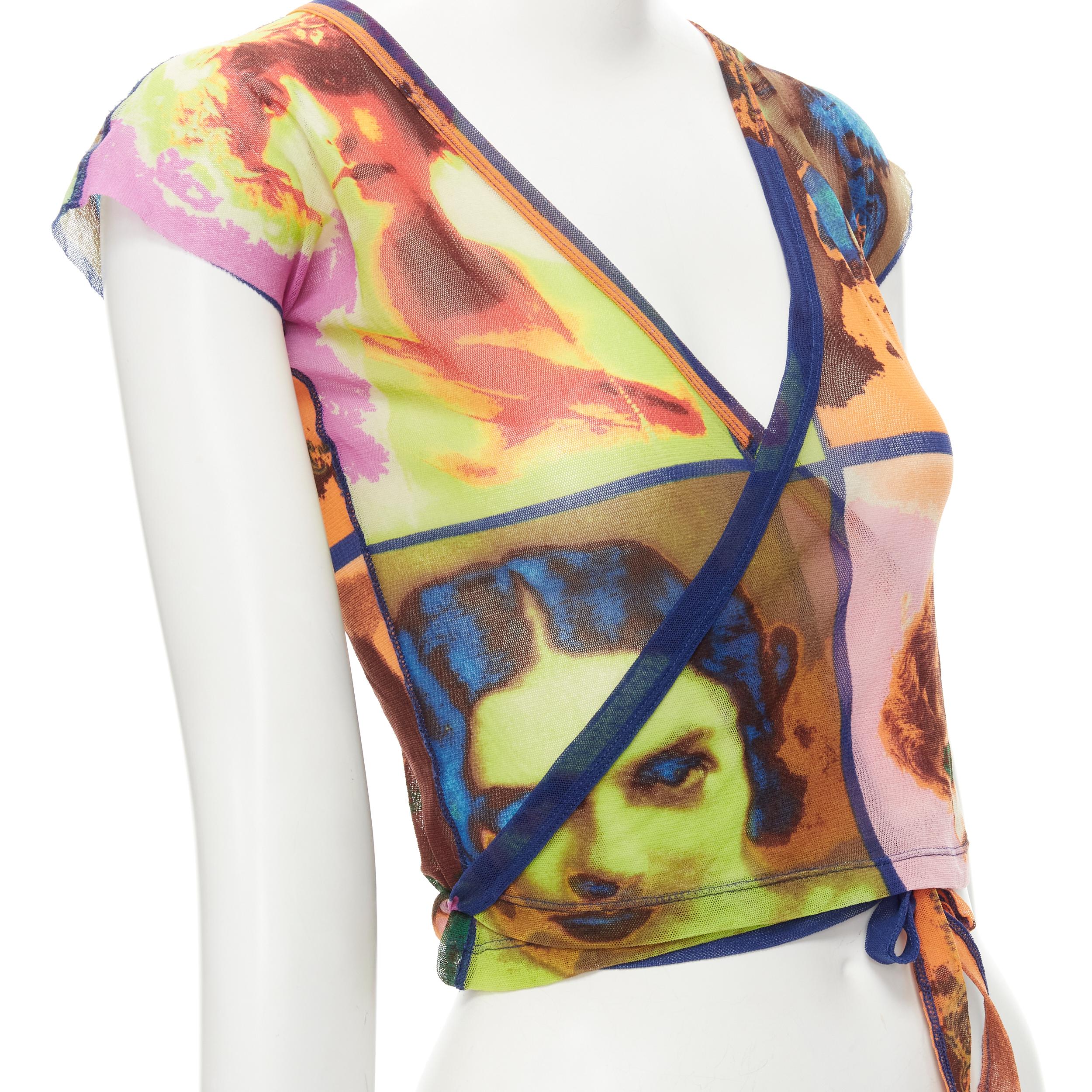 JEAN PAUL GAULTIER Soleil Vintage 2002 Portaits print sheer wrap tie top shirt M 
Reference: TGAS/C01040 
Brand: Jean Paul Gaultier Soleil 
Designer: Jean Paul Gaultier 
Collection: Spring Summer 2002 Portraits Runway 
Material: Polyester 
Color: