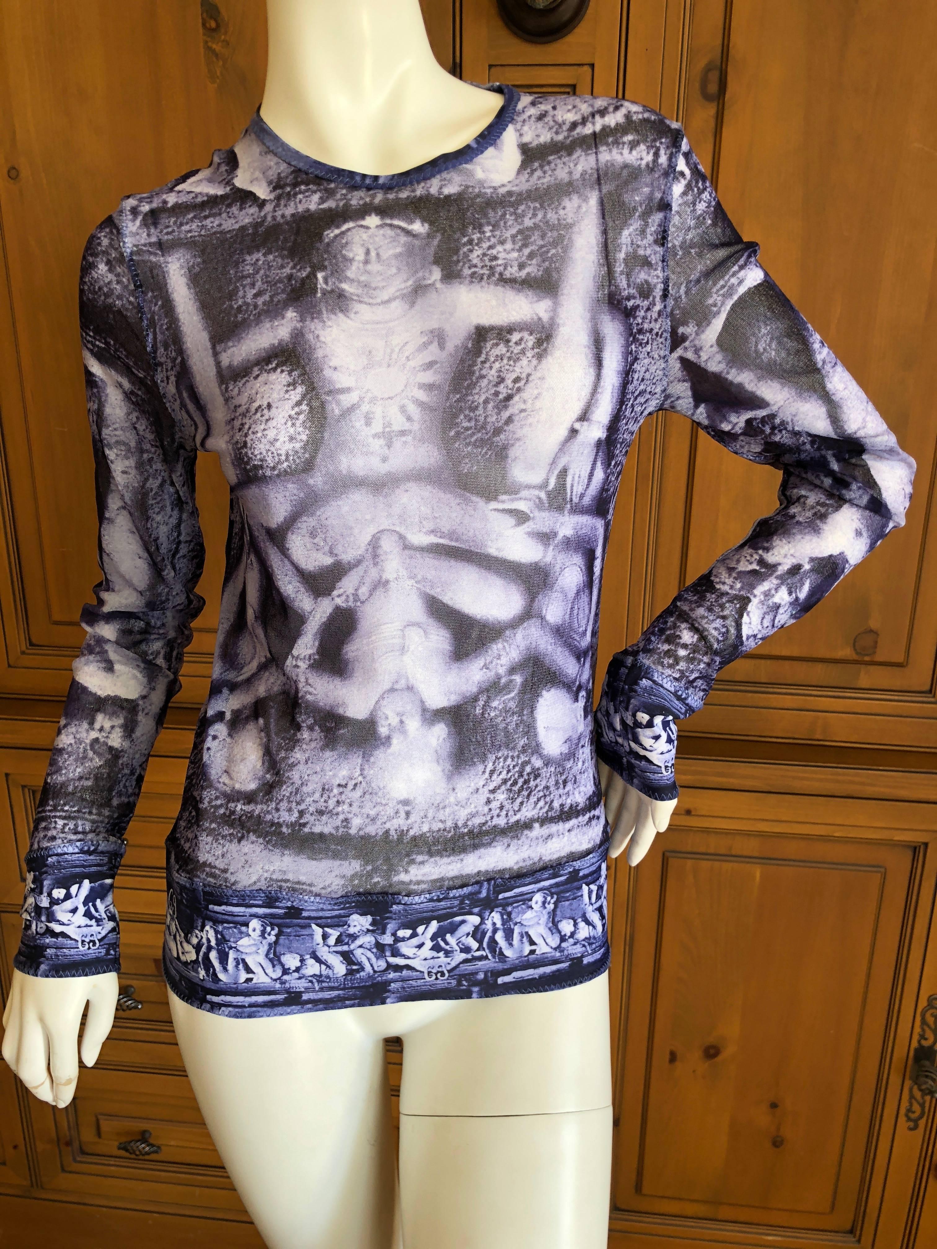 Wonderful sheer top from John Paul Gaultier Soliel, featuring erotic images from the Kama Sutra.
Size S
Bust 38