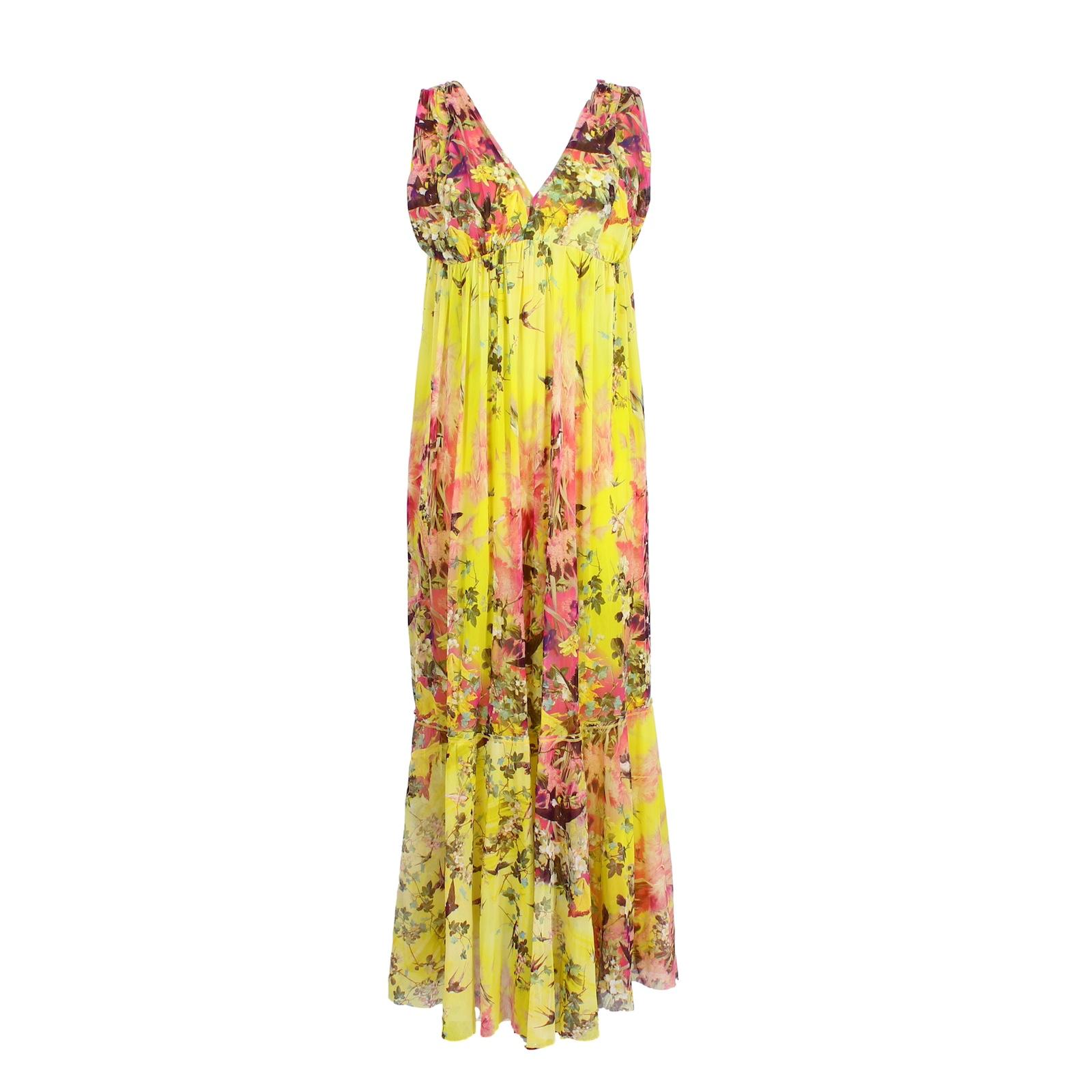The Jean Paul Gaultier Soleil Yellow Long Dress from the 2000s is an eye-catching dress adorned with floral and bird designs. Made with a Fuzzi texture and lined for comfort, this dress features a V-neck and is perfect for any occasion. Elevate your