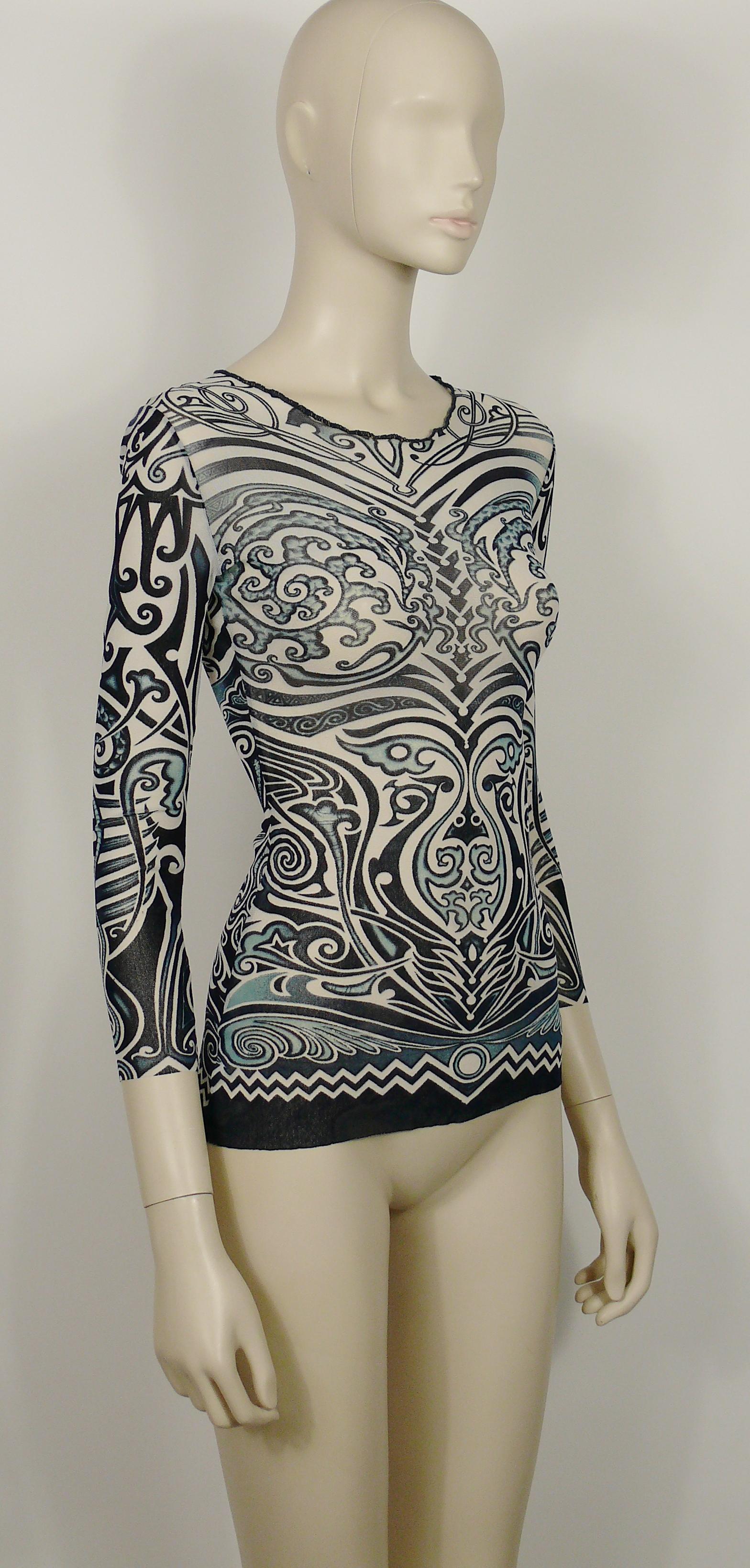 JEAN PAUL GAULTIER vintage iconic sheer mesh tribal tattoo print top in shades of blue on a white background.

Spring/Summer 1996 Collection.

Label reads JEAN PAUL GAULTIER Maille.
Made in Italy.

Size label reads : S.
Please refer to