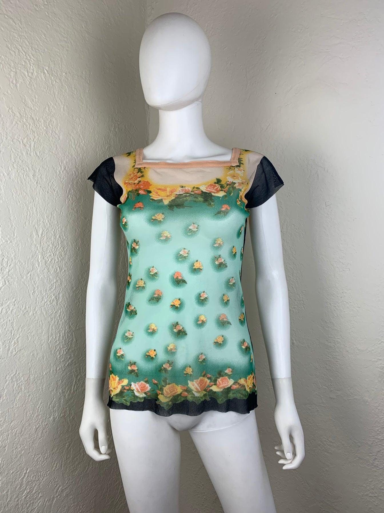 Jean-Paul Gaultier short sleeve floral rose print top from S/S 2001 collection. Print seen on Kendall Jenner in the summer of 2022.

- Guaranteed 100% Authentic.

- Perfect preowned condition.

- Description: Pink and yellow roses and green foliage