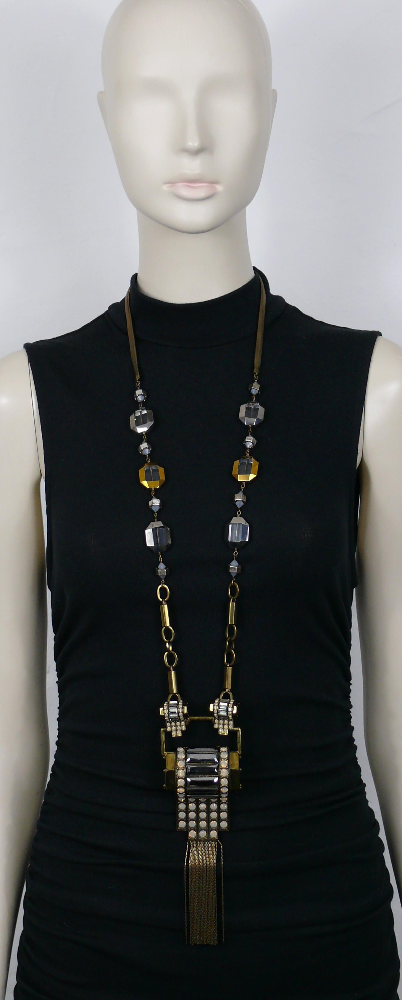 JEAN PAUL GAULTIER statement bronze tone Art Deco inspired sautoir necklace featuring glass beads and a massive pendant with chain tassel embellished with light grey opal color crystals.

Box clasp closure with crystal embellishement.

Embossed JEAN