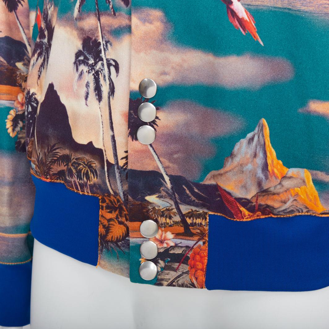 JEAN PAUL GAULTIER Tropical print blue cotton blend bomber jacket FR48 M
Reference: PRCG/A00021
Brand: Jean Paul Gaultier
Designer: Jean Paul Gaultier
Material: Cotton, Blend
Color: Blue, Multicolour
Pattern: Palm Tree
Closure: Snap Buttons
Lining: