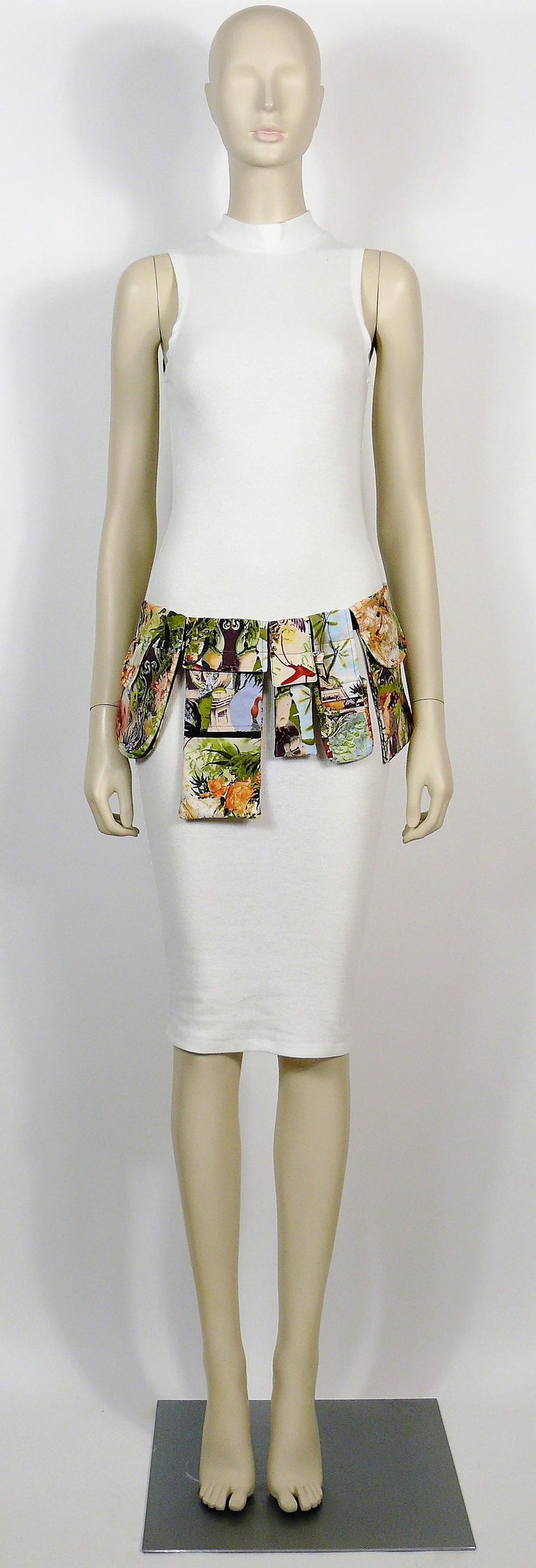 JEAN PAUL GAULTIER utility belt featuring 5 removable pockets (some with velcro closures, others with zippered closure) hanging on an black estaticated strap.

Great multicolored summer tropical print with flamingos, birds and architectural