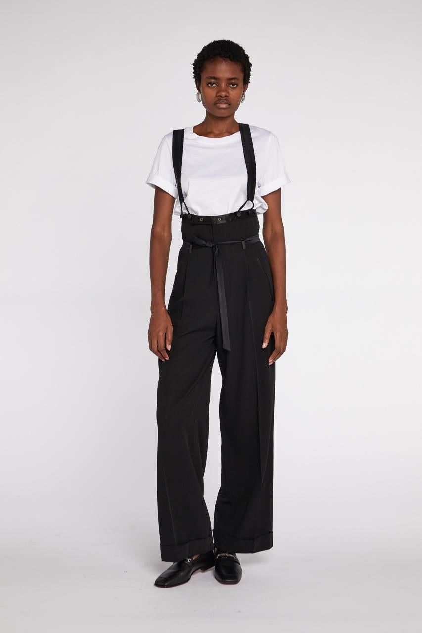 - Early 2000s Jean Paul Gaultier Classique

- Sold by Mae Vintage London

- Ultra high waisted tuxedo trousers with Satin belt and braces

- Excellent condition 

