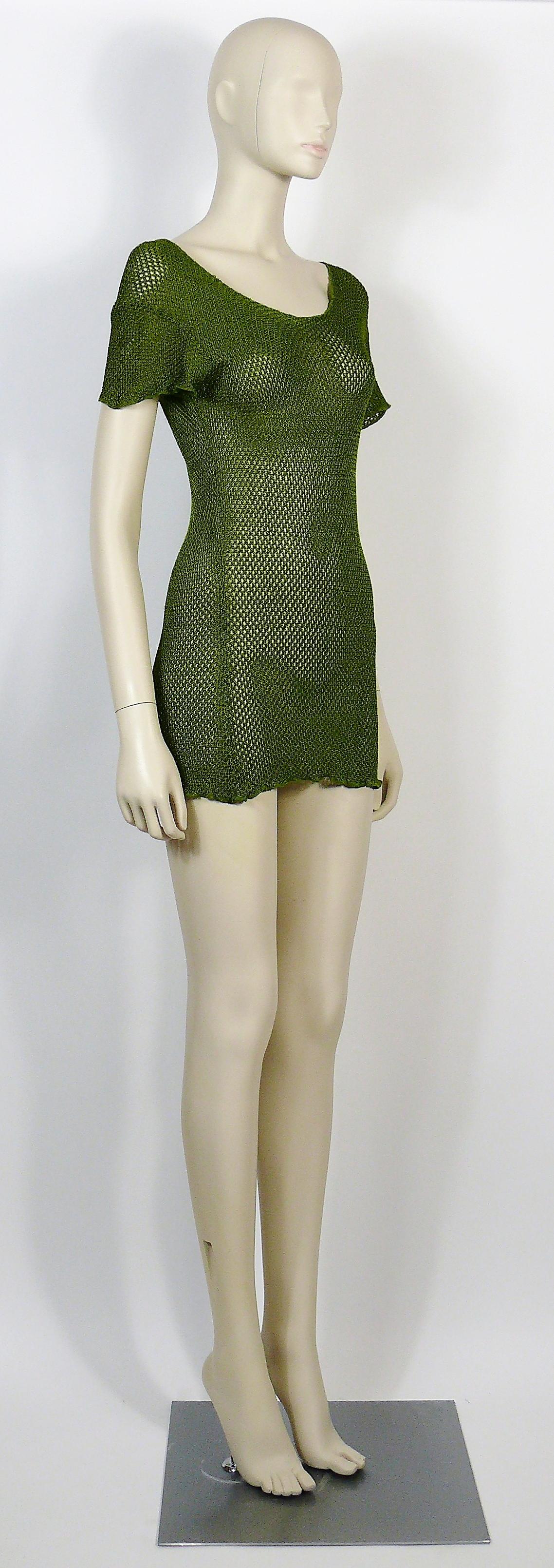 JEAN PAUL GAULTIER vintage 1990s green fishnet mini dress.

Label reads JUNIOR GAULTIER Made in Italy.

Size tag reads :52.
Please refer to measurements.

Composition tag reads : 98% Viscose / 2% Elastan.

Indicative measurements taken laid flat and